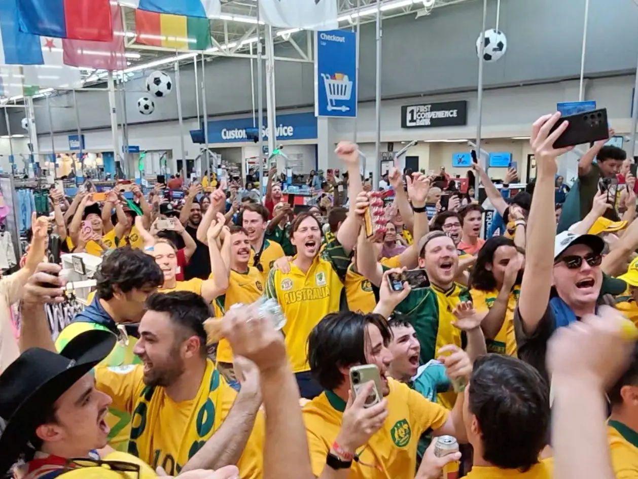 Australia fans react while taking over a Walmart near Dallas stadium ahead of the Australia v Egypt match in the Round of 32 during the FIFA World Cup 2026, in Texas, U.S. July 3, 2026