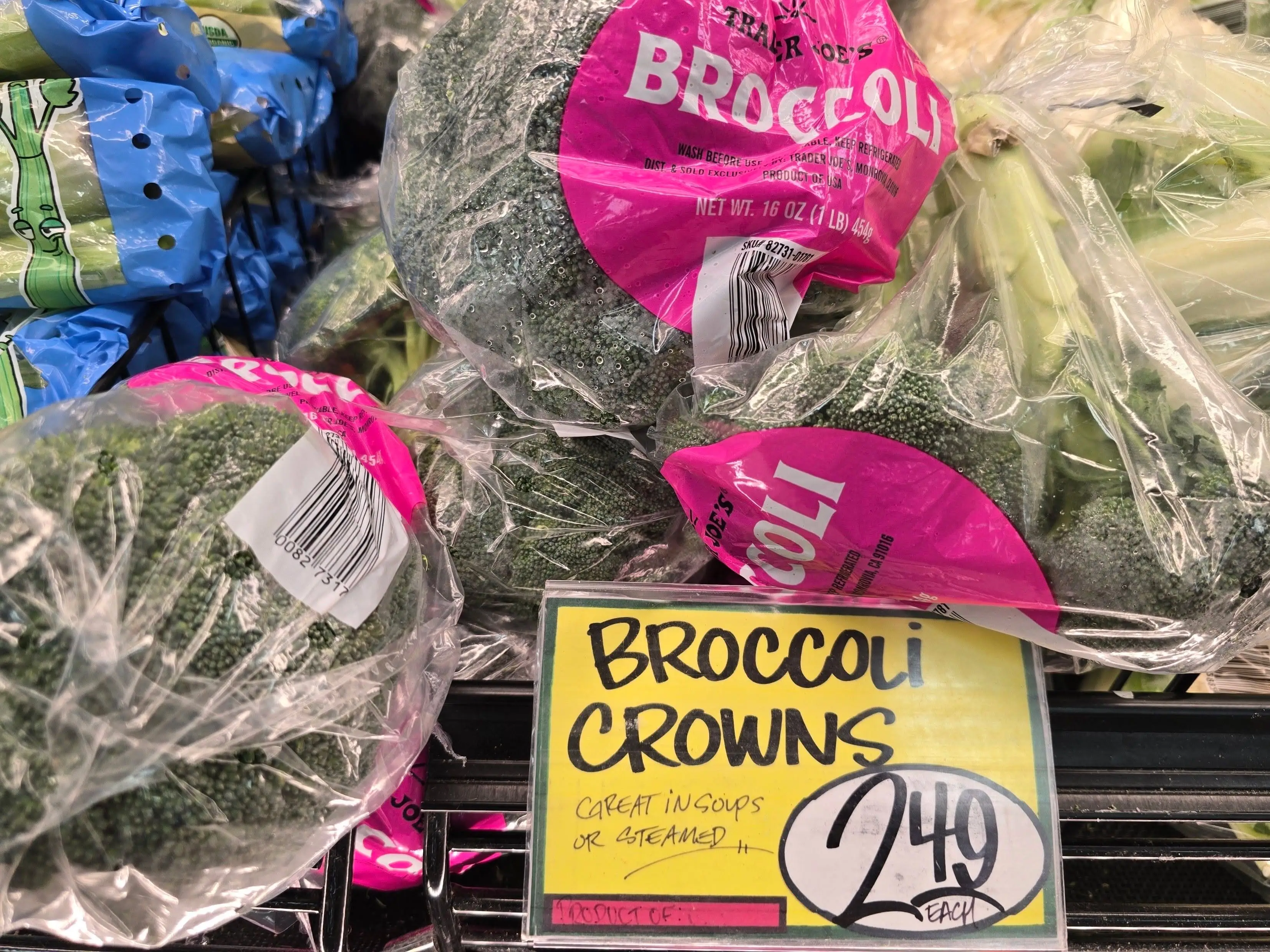 Bags of broccoli crowns at Trader Joe's.