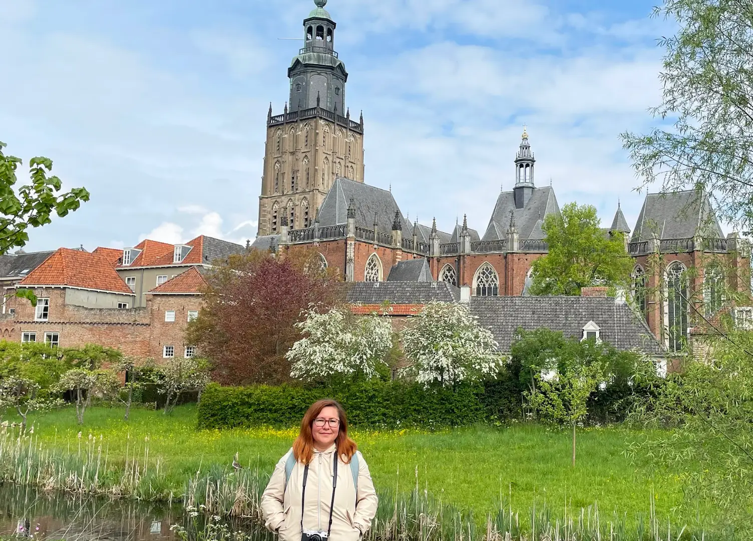 The writer standing in front of a medieval building in Zutphen, the Netherlands.