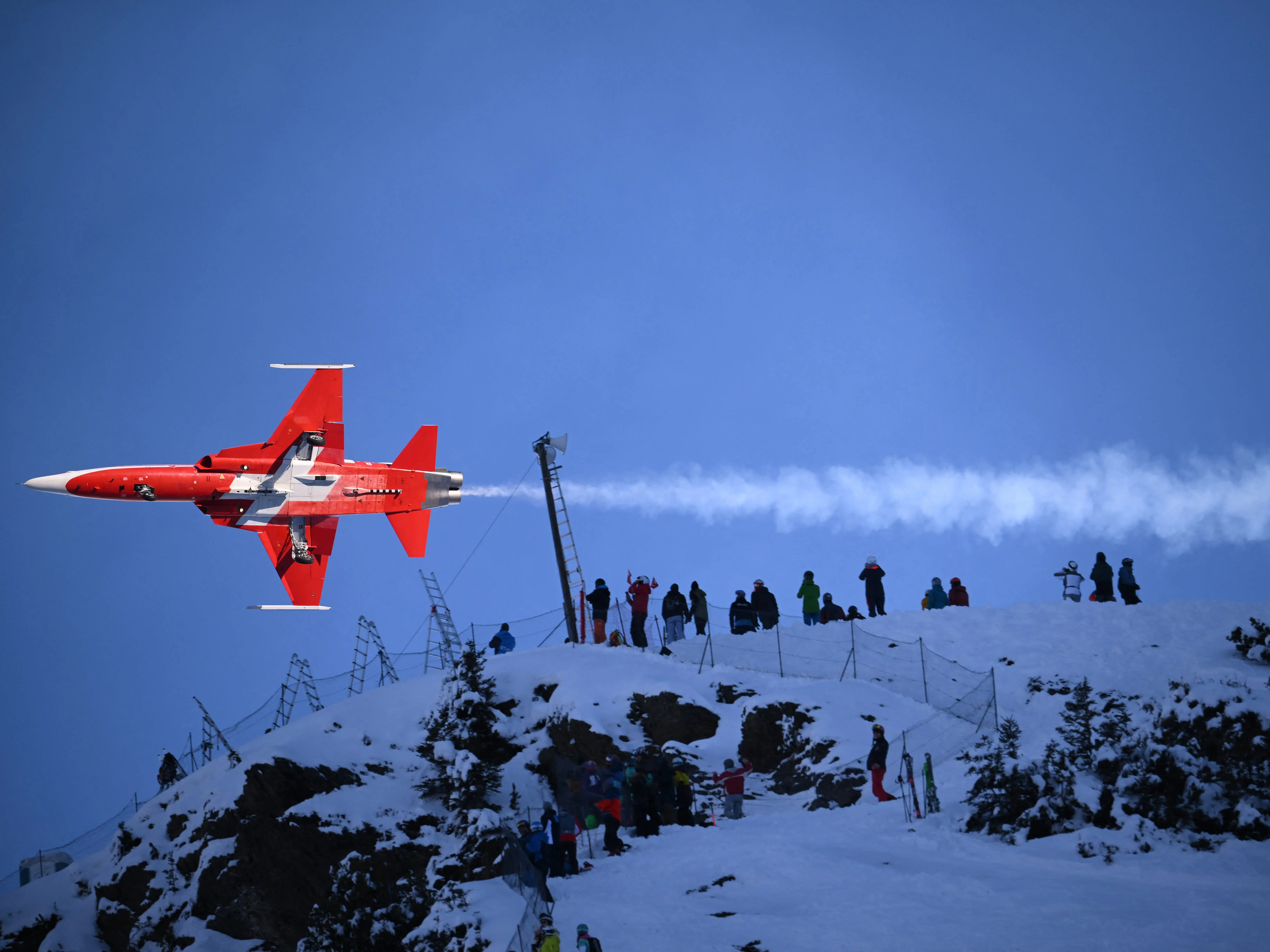 Swiss Air Force flies over the mountains prior to the start of the Men's Downhill race at the FIS Alpine Skiing World Cup event in Wengen, Switzerland, on January 11, 2024.