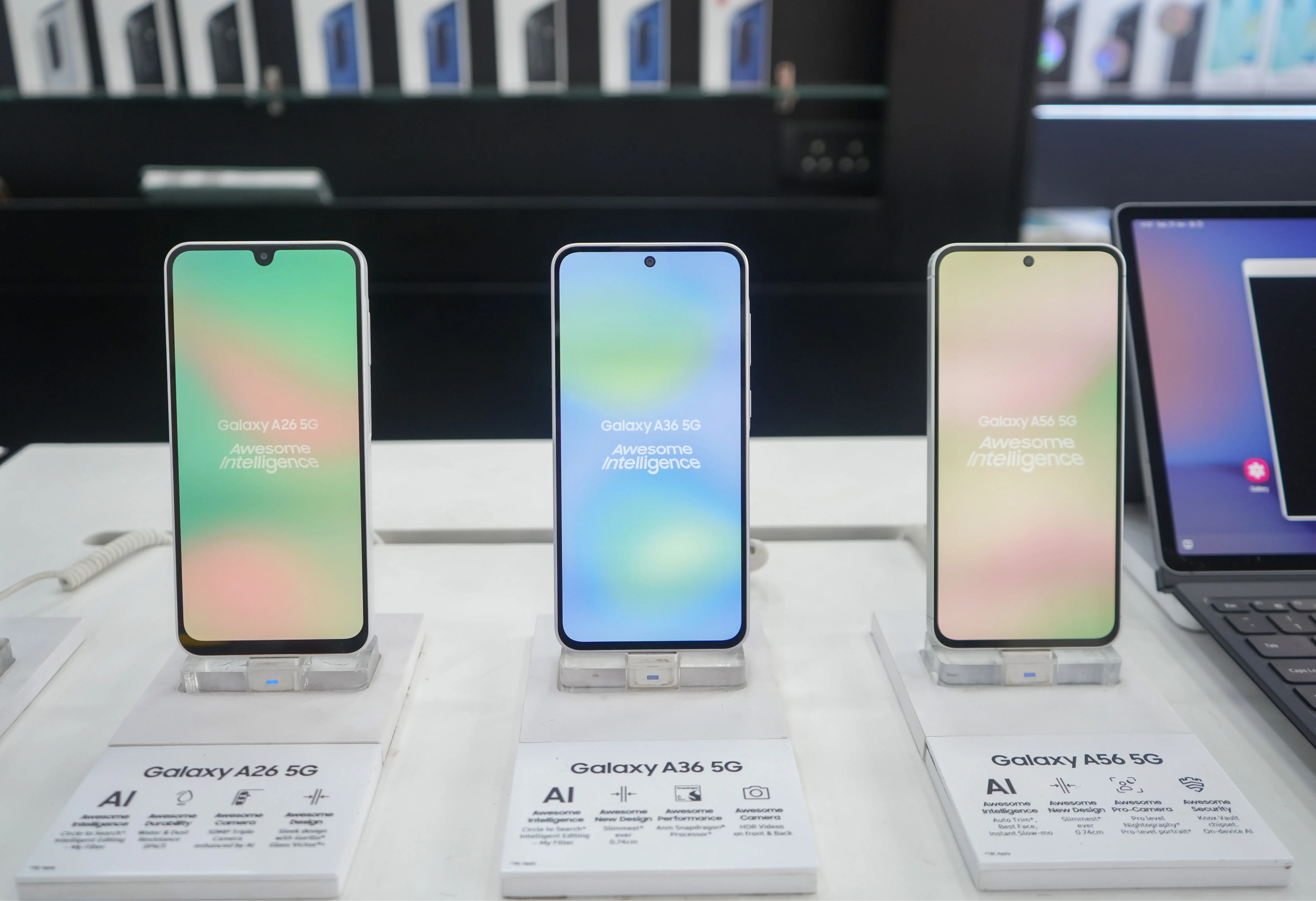 Three Galaxy phones are on display.