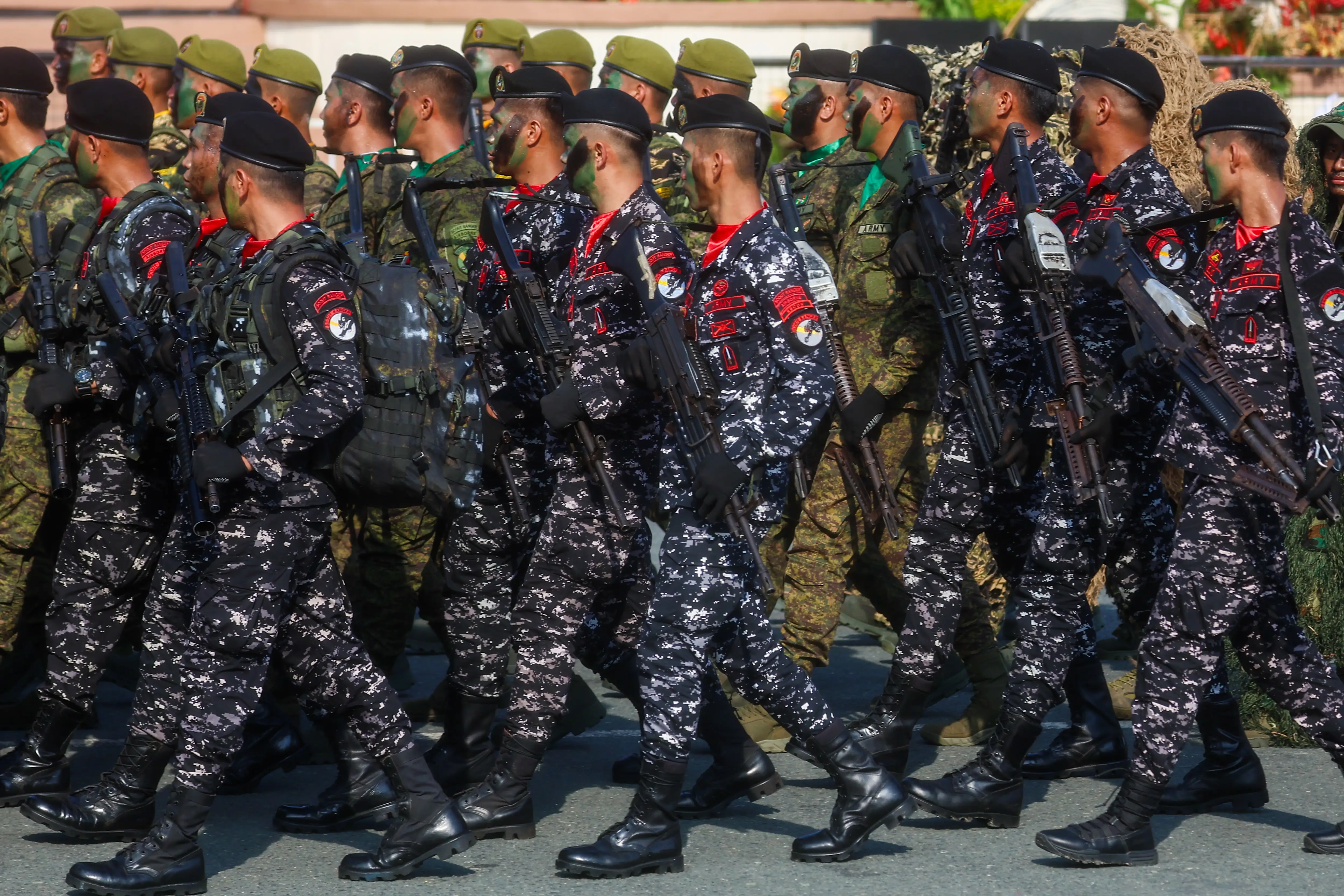 Filipino Army soldiers march during a military parade marking the 128th anniversary of Independence Day, in Manila, Philippines, on June 12, 2026.
