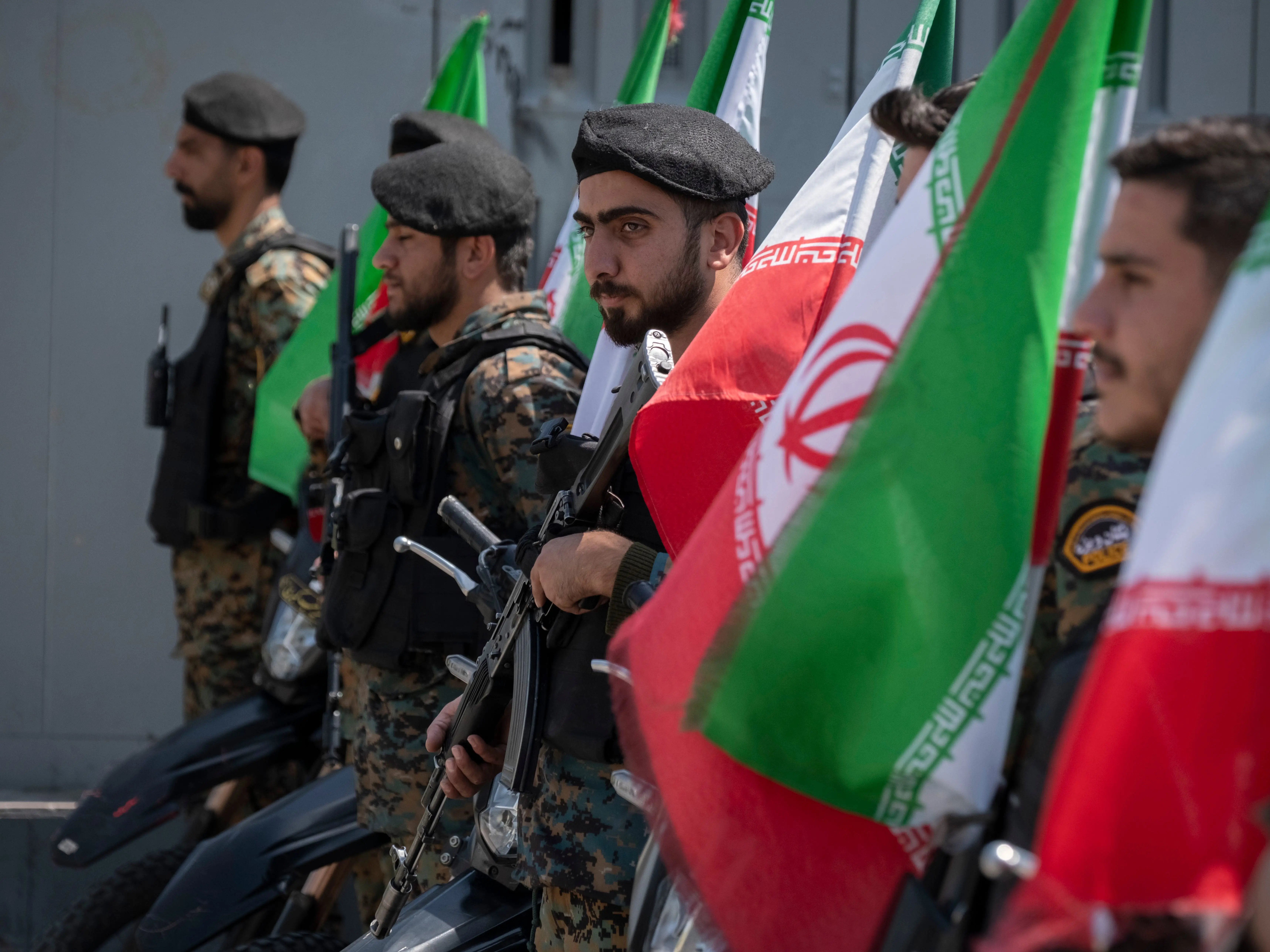 Iranian police officers stand guard outside a square during a pro-government rally commemorating Iran's female fighters, known as the country's self-sacrificing daughters, ahead of a military parade in southern Tehran, Iran, on April 17, 2026, during a ceasefire between Iran and the United States-Israeli coalition.