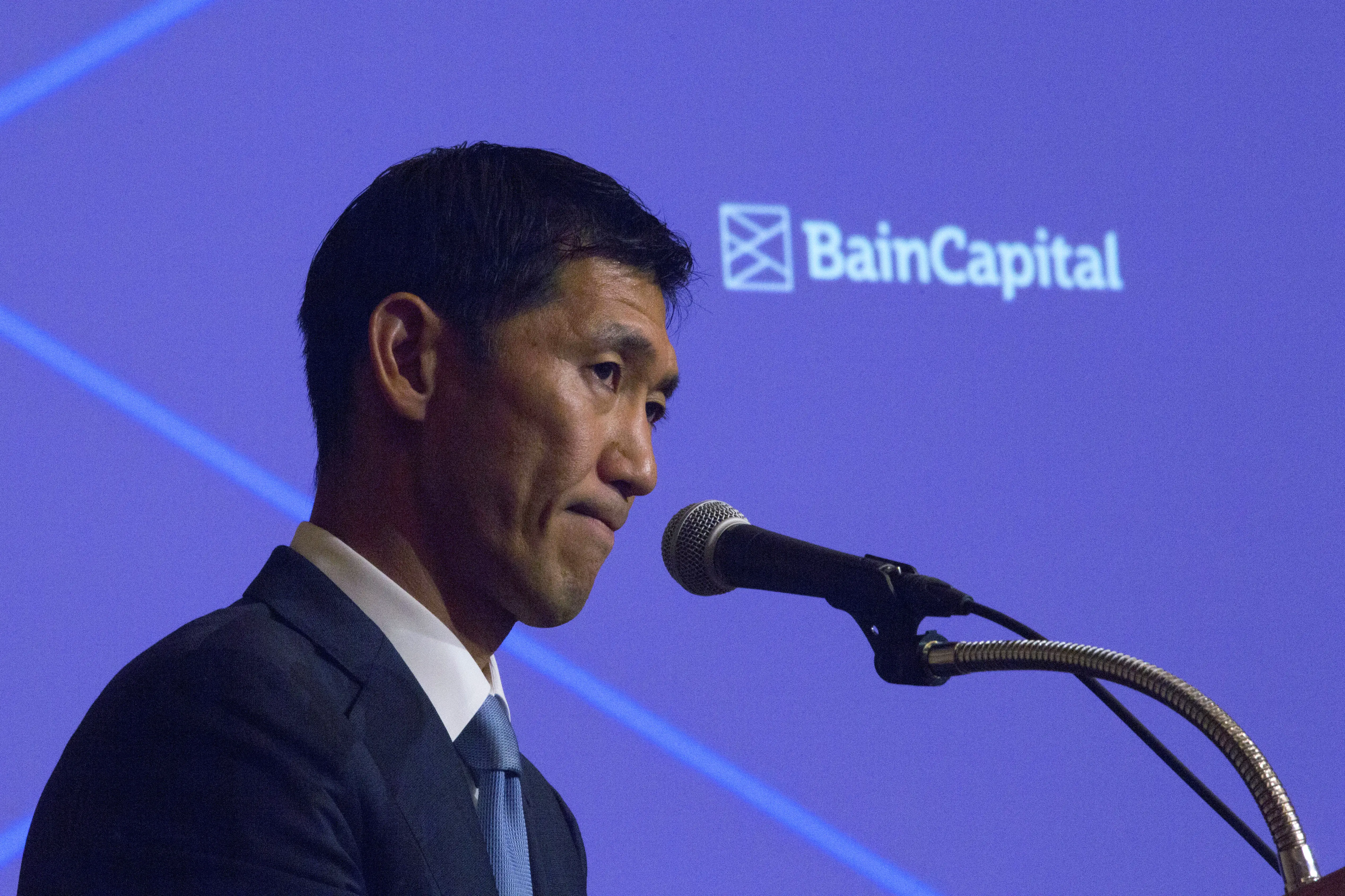 Yuji Sugimoto, managing director of Bain Capital Private Equity, speaks during a news conference in Tokyo, Japan.