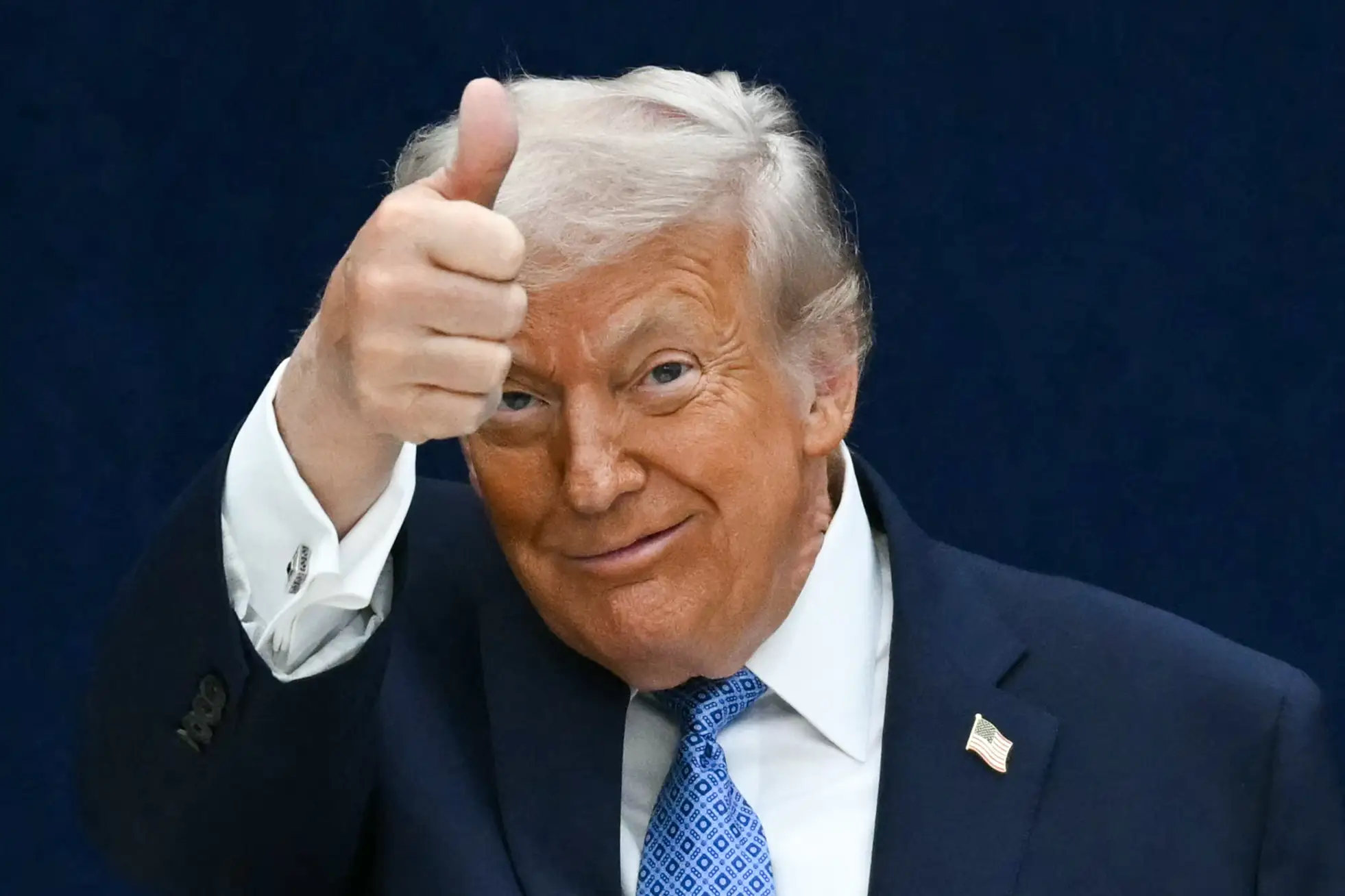 Donald Trump gives a thumbs up