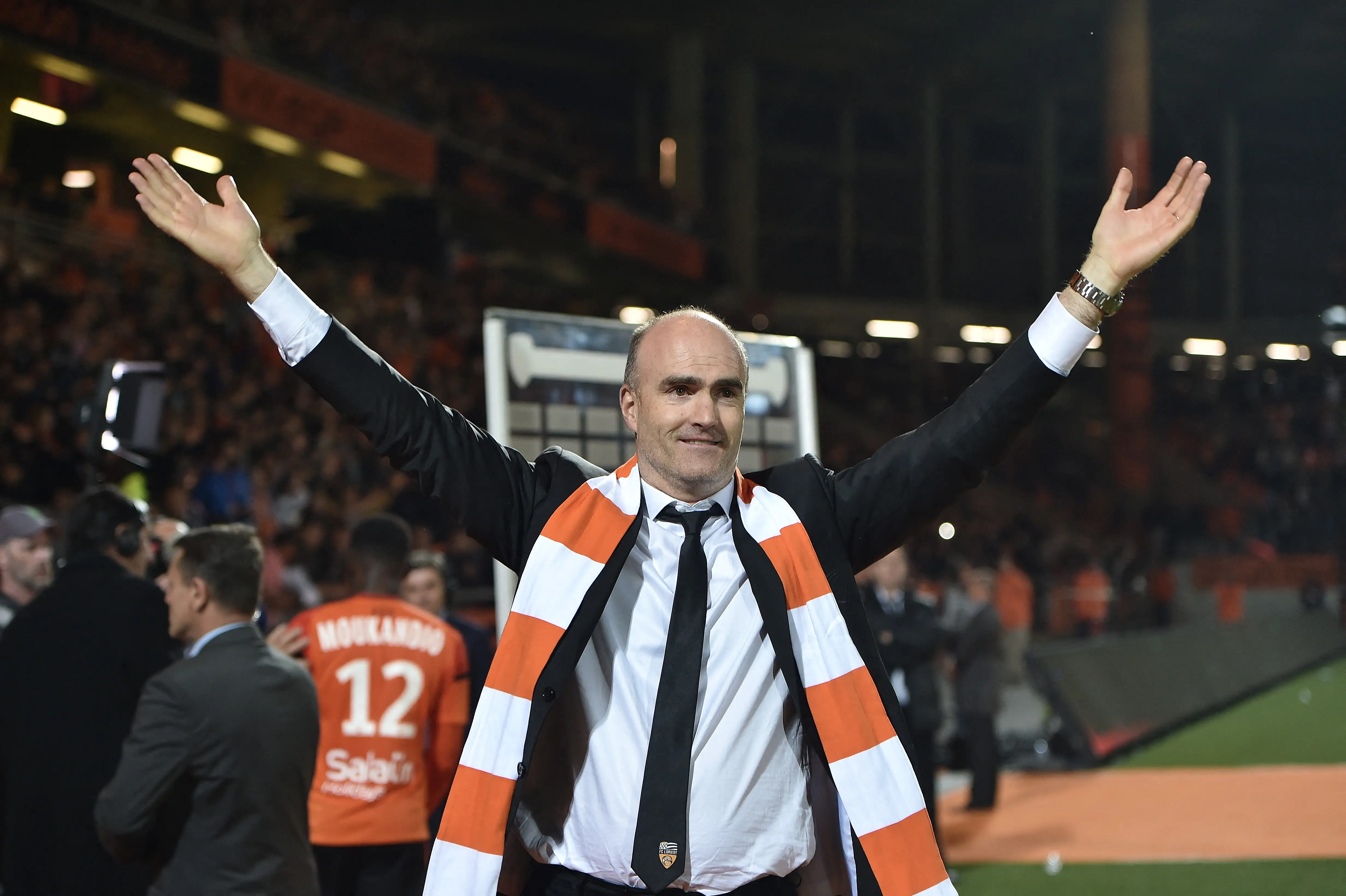 Lorient's French president Loic Fery celebrates at the end of the French L1 football match between Lorient and Metz on April 22, 2017 at the Moustoir stadium of Lorient, western France. Lorient won 5-1