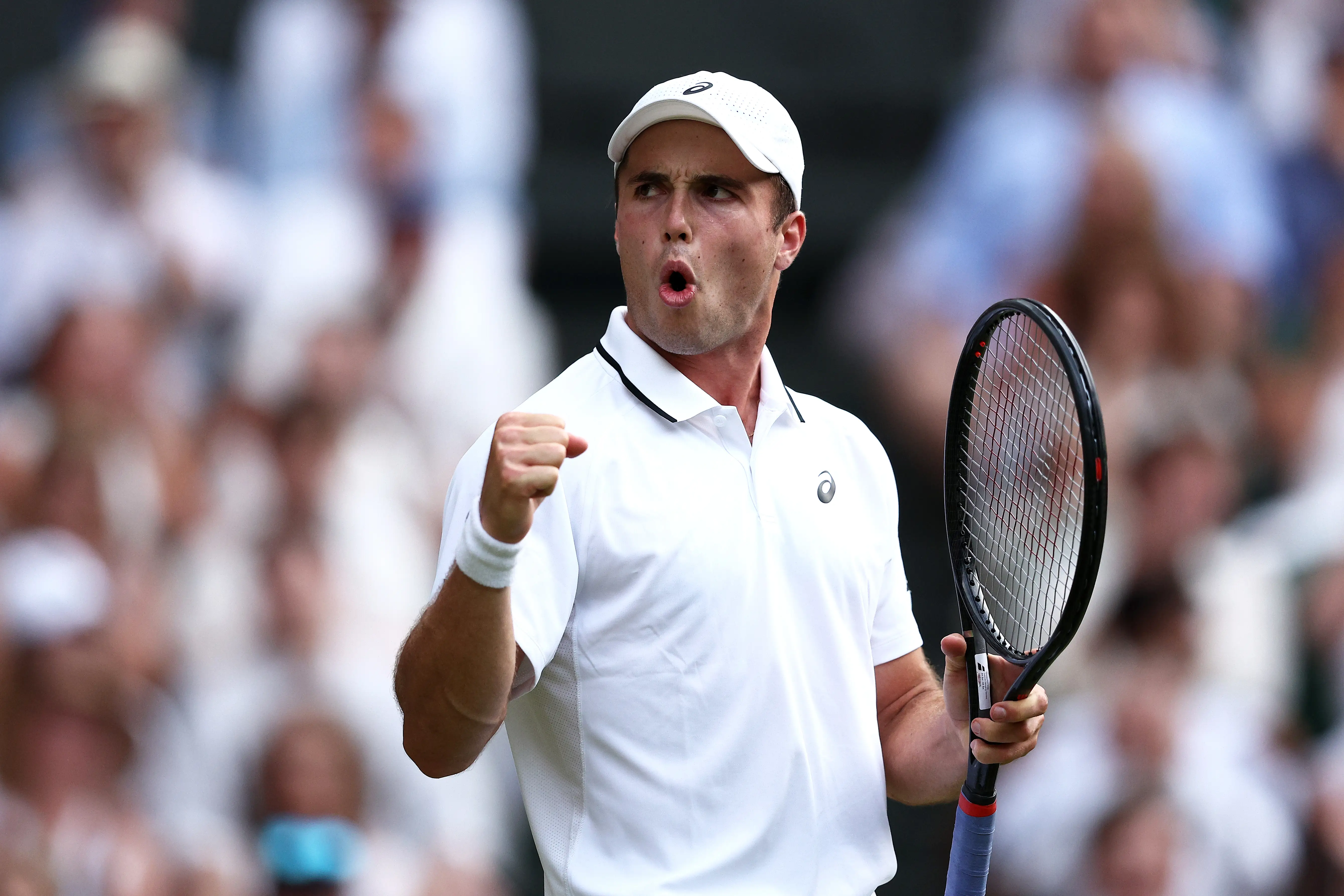 Arthur Fery of Great Britain celebrates against Grigor Dimitrov of Bulgaria during their Gentlemen's Singles fourth round match on day eight of The Championships Wimbledon 2026 at All England Lawn Tennis and Croquet Club on July 06, 2026 in London, England.