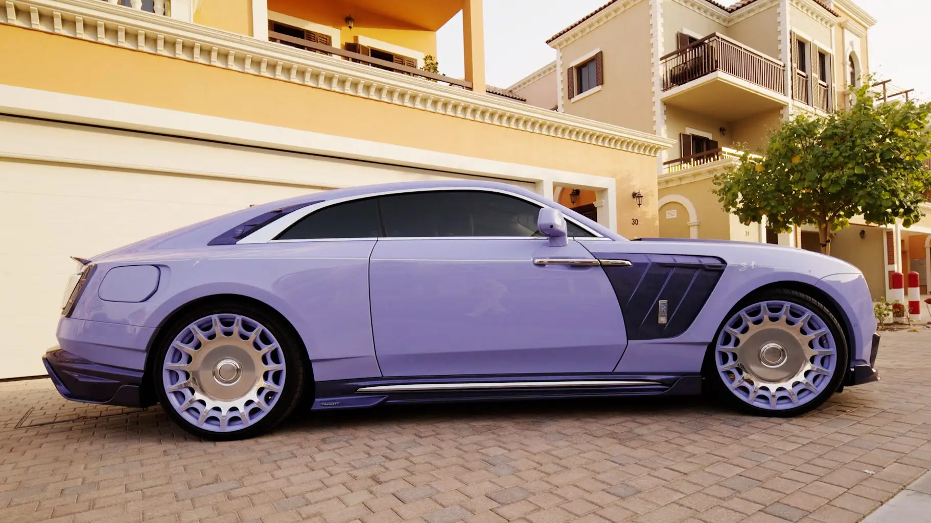 Alex Hirschi's custom purple Rolls Royce Spectre