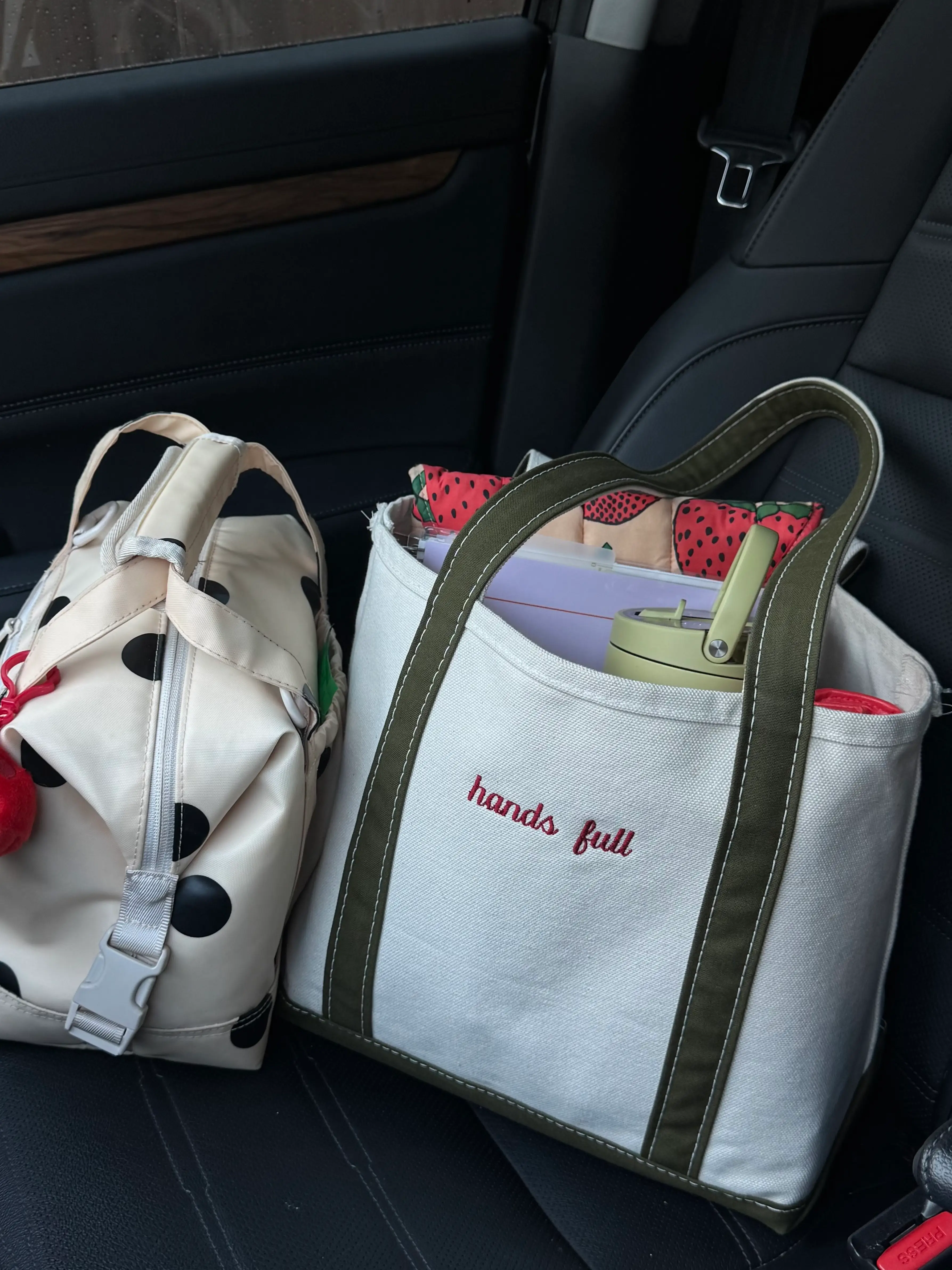 Priscilla Angier's L.L. Bean Boat and Tote bag that says 