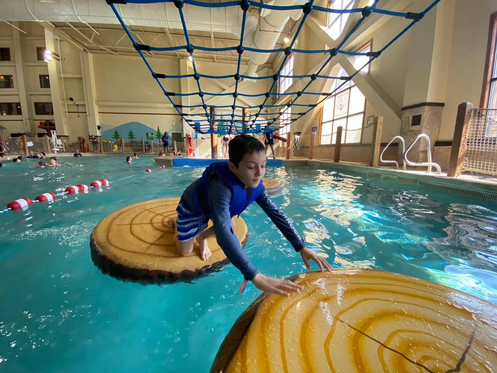 the author's son in a pool