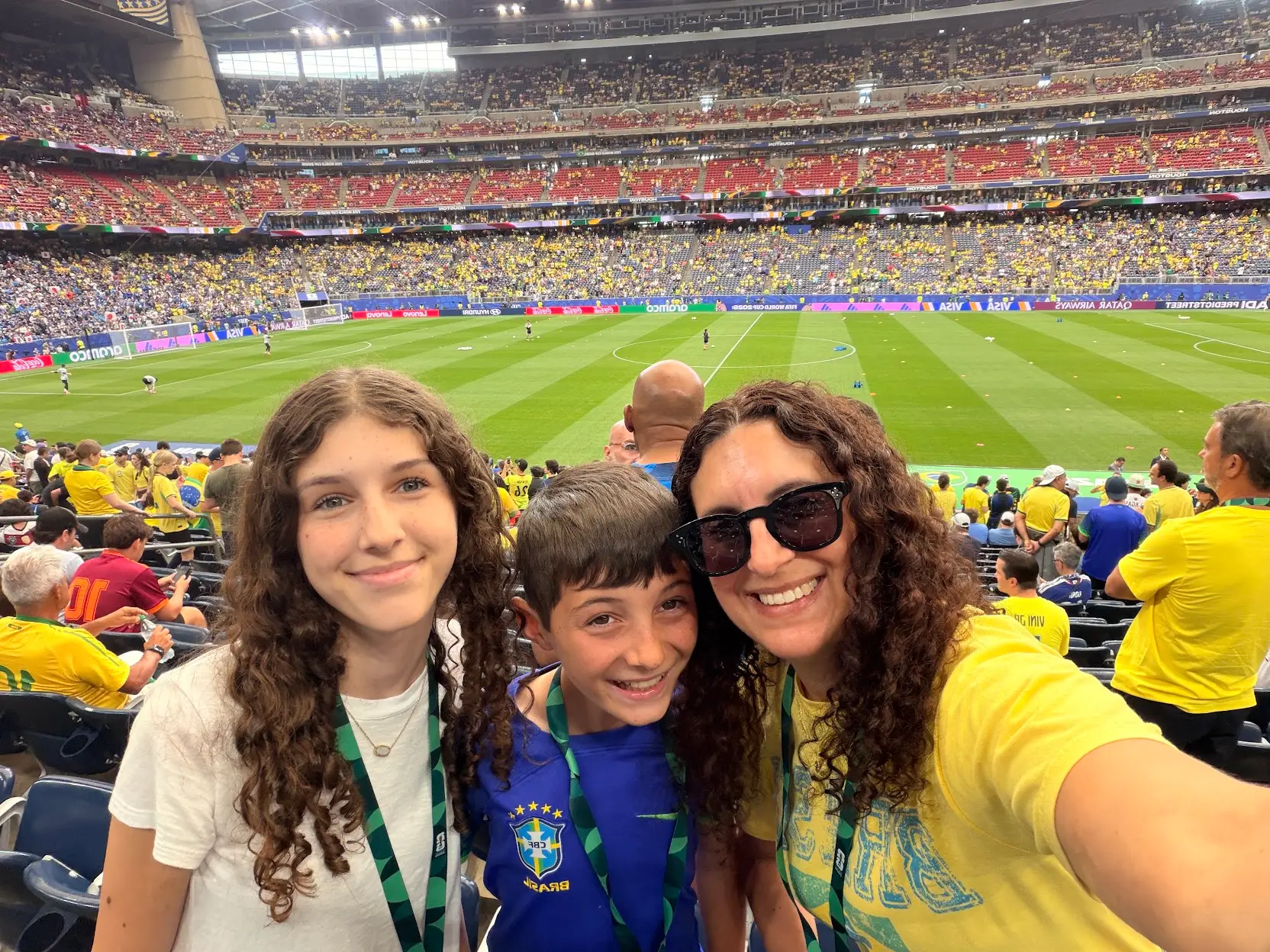 The author at the World Cup in Houston with her son and daughter.