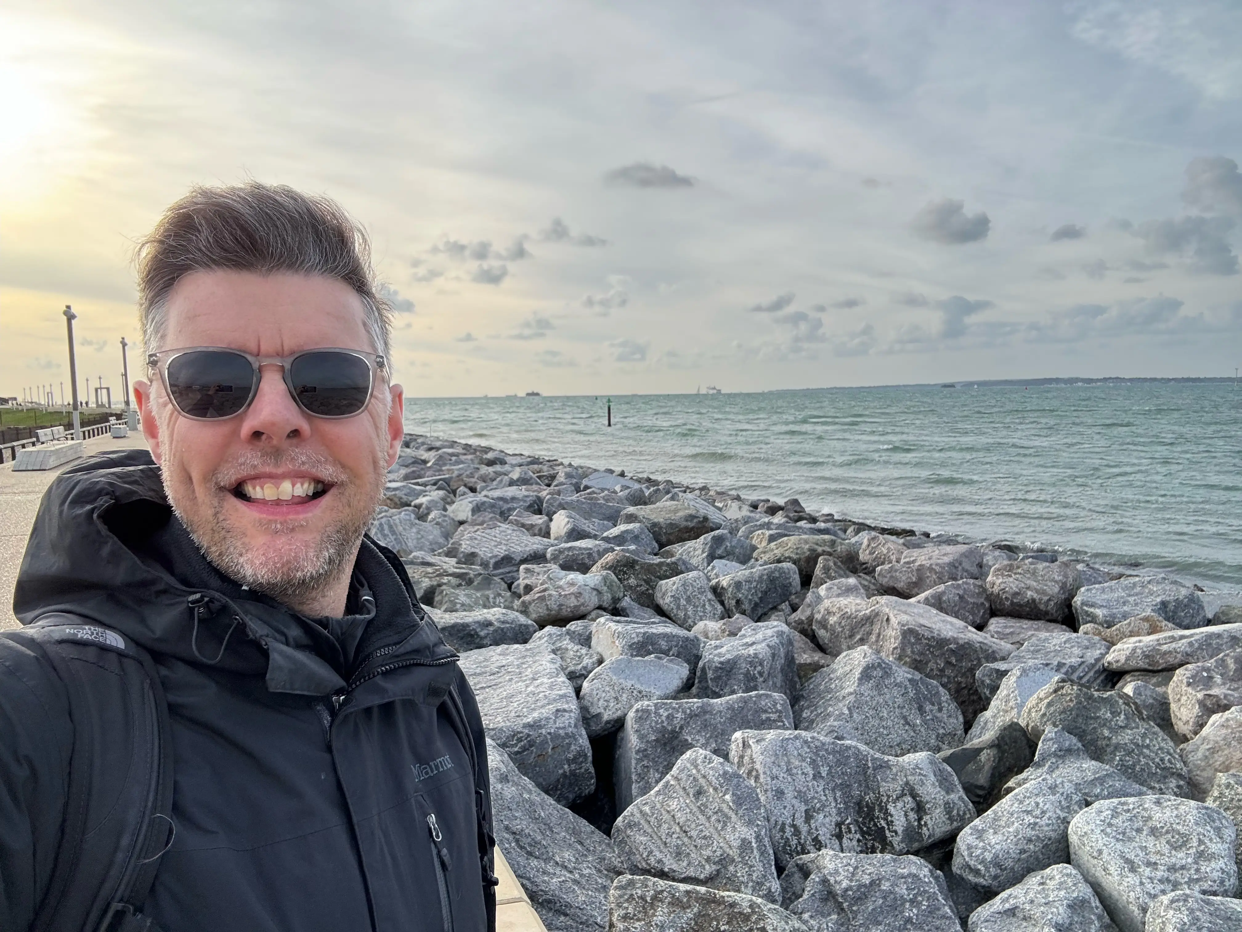 Man taking selfie by the water