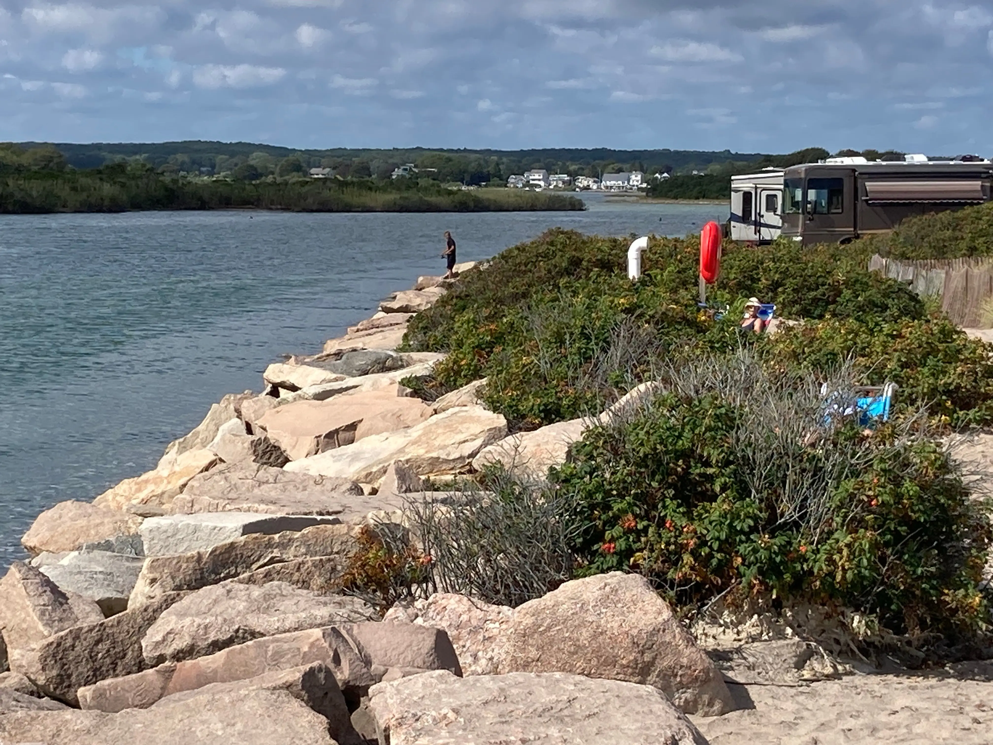 Beaches and rocks by the water in Charlestown, Rhode Island.