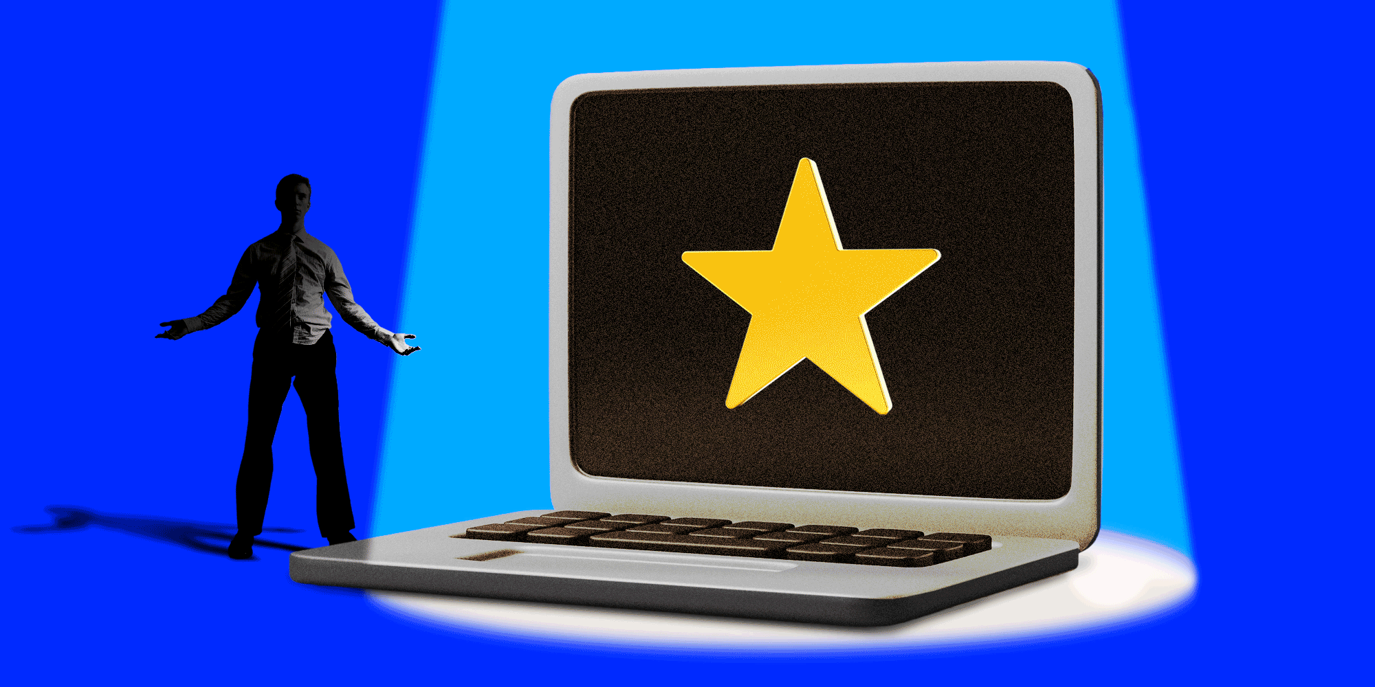A frustrated businessman looking at a laptop with a gold star