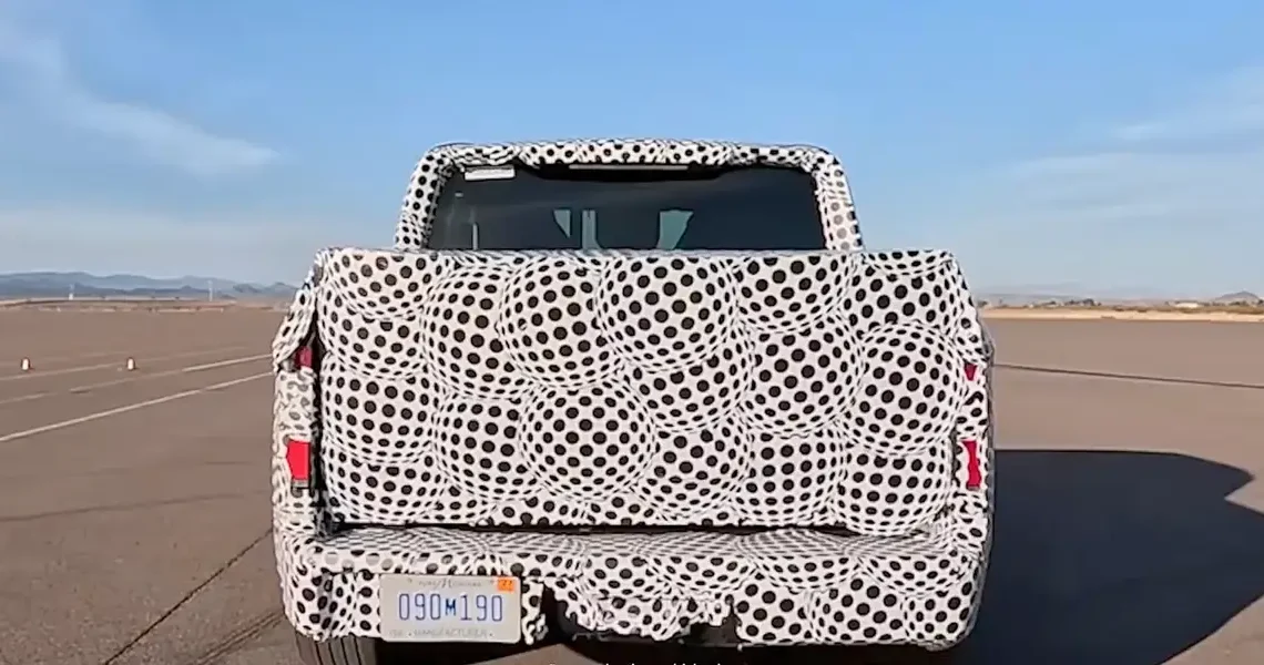 Ford’s $30,000 EV truck is under wraps. Its camouflage is an ad.