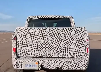 Ford’s $30,000 EV truck is under wraps. Its camouflage is an ad.