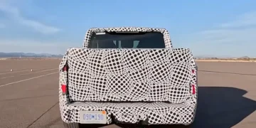 Ford’s $30,000 EV truck is under wraps. Its camouflage is an ad.