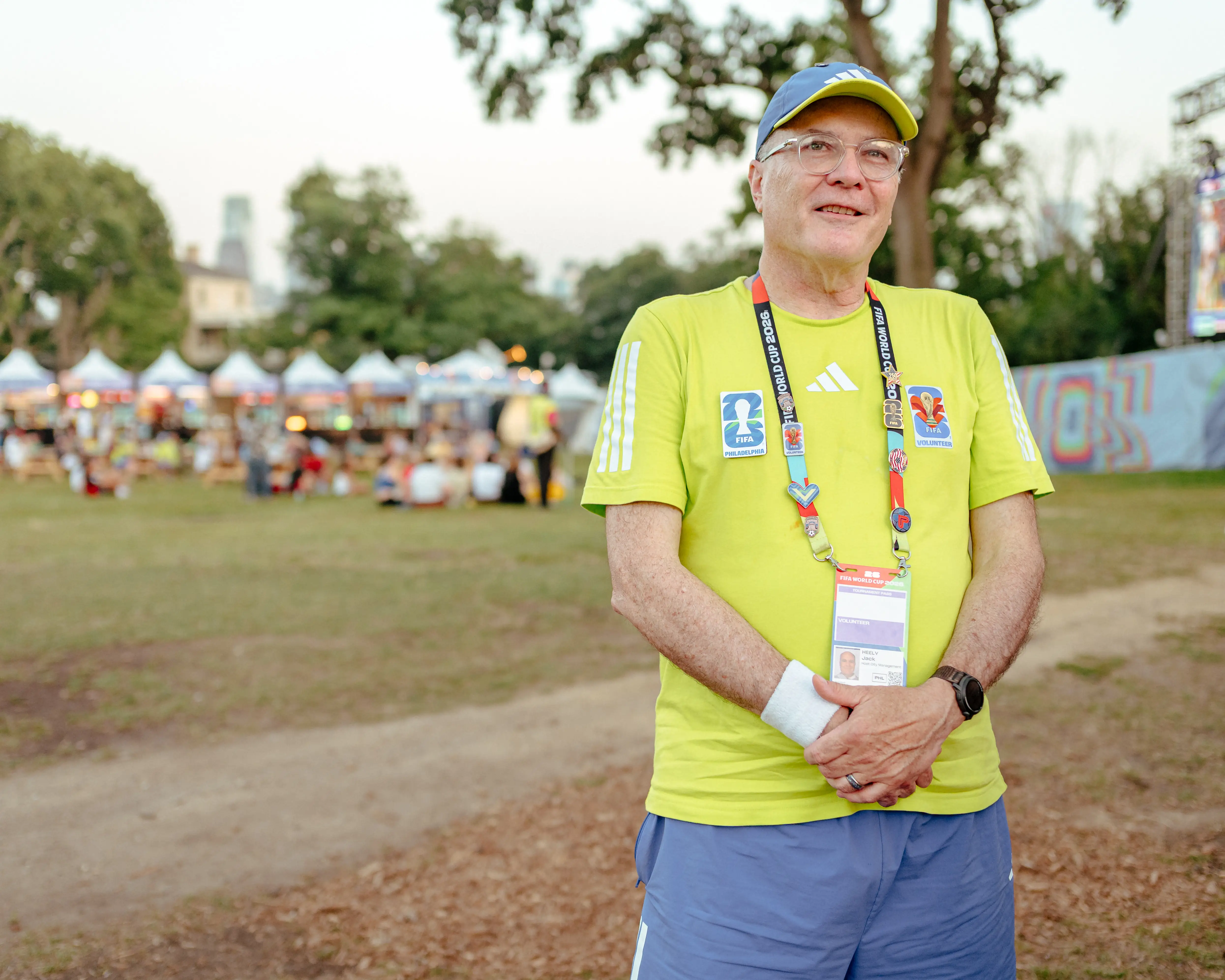 Jack Heely, a FIFA FanFest volunteer, poses for a photo.