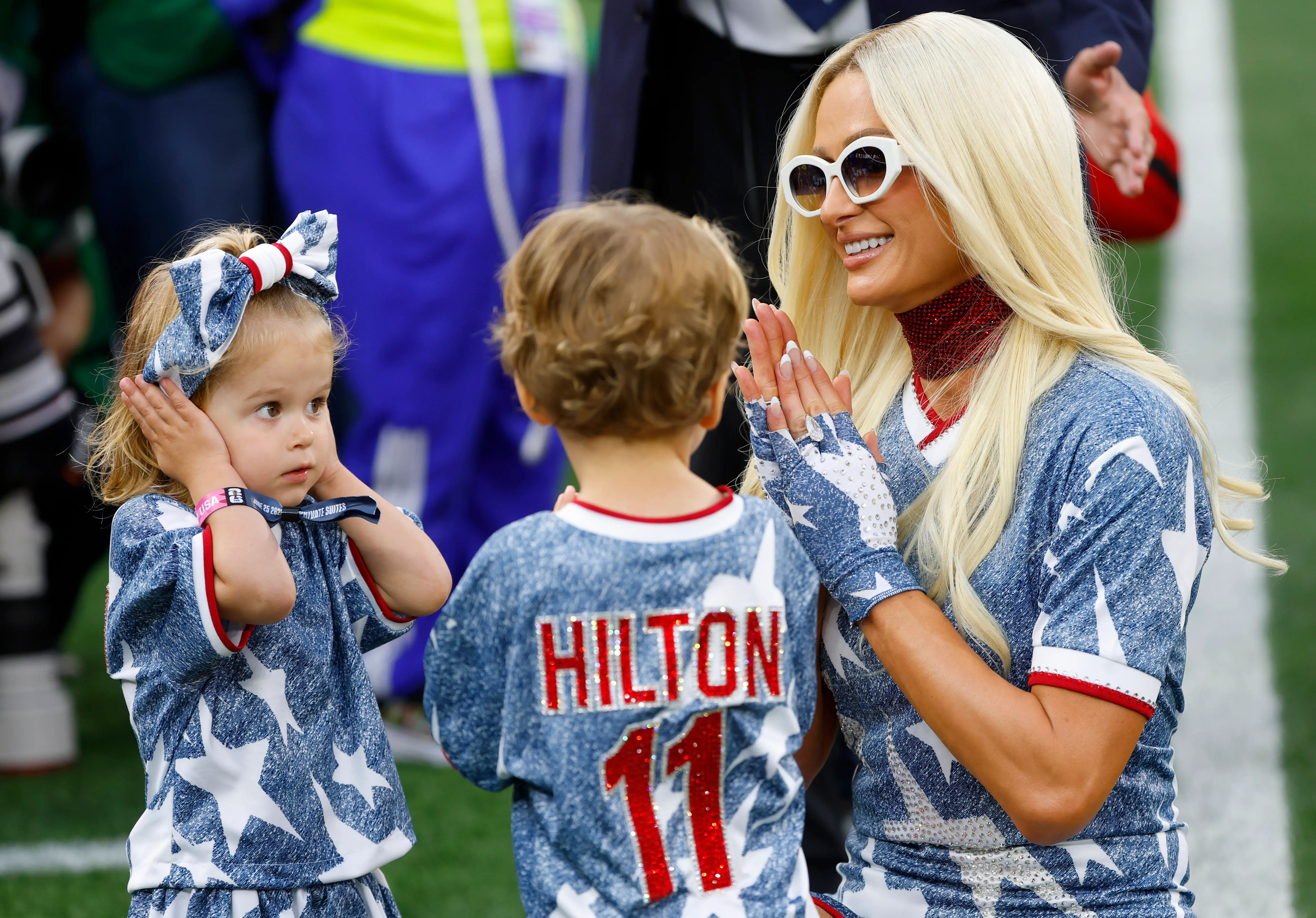 Paris Hilton and her children Phoenix Hilton-Reum and London Hilton-Reum are seen before the FIFA World Cup 2026 Group D match between Türkiye and USA at Los Angeles Stadium on June 25, 2026 in Inglewood, California.