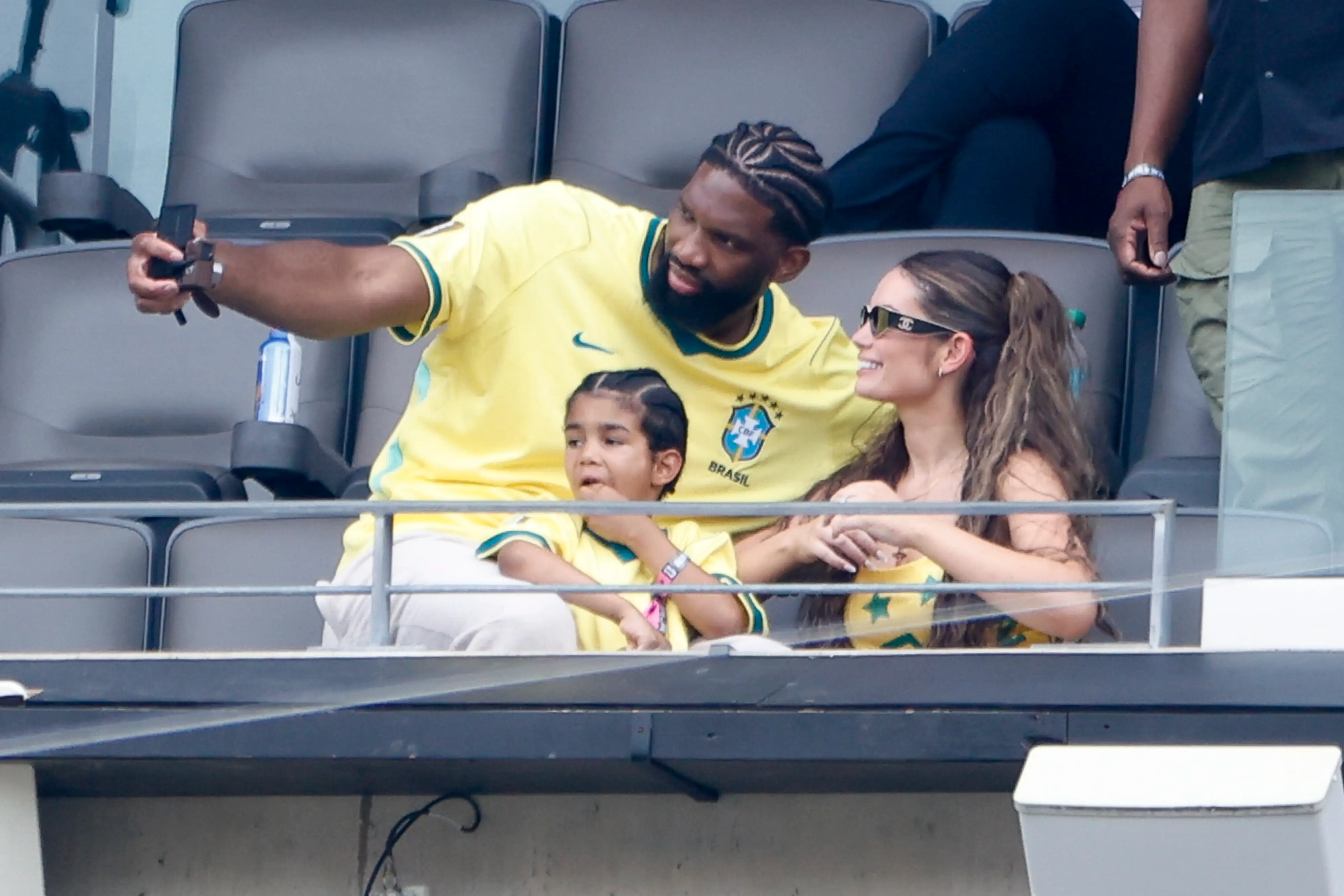NBA star Joel Embiid, his wife Anne de Paula from Brazil and their son attend the FIFA World Cup 2026 Round Of 16 football match between Brazil and Norway at New York New Jersey Stadium on July 5, 2026 in East Rutherford, New Jersey.
