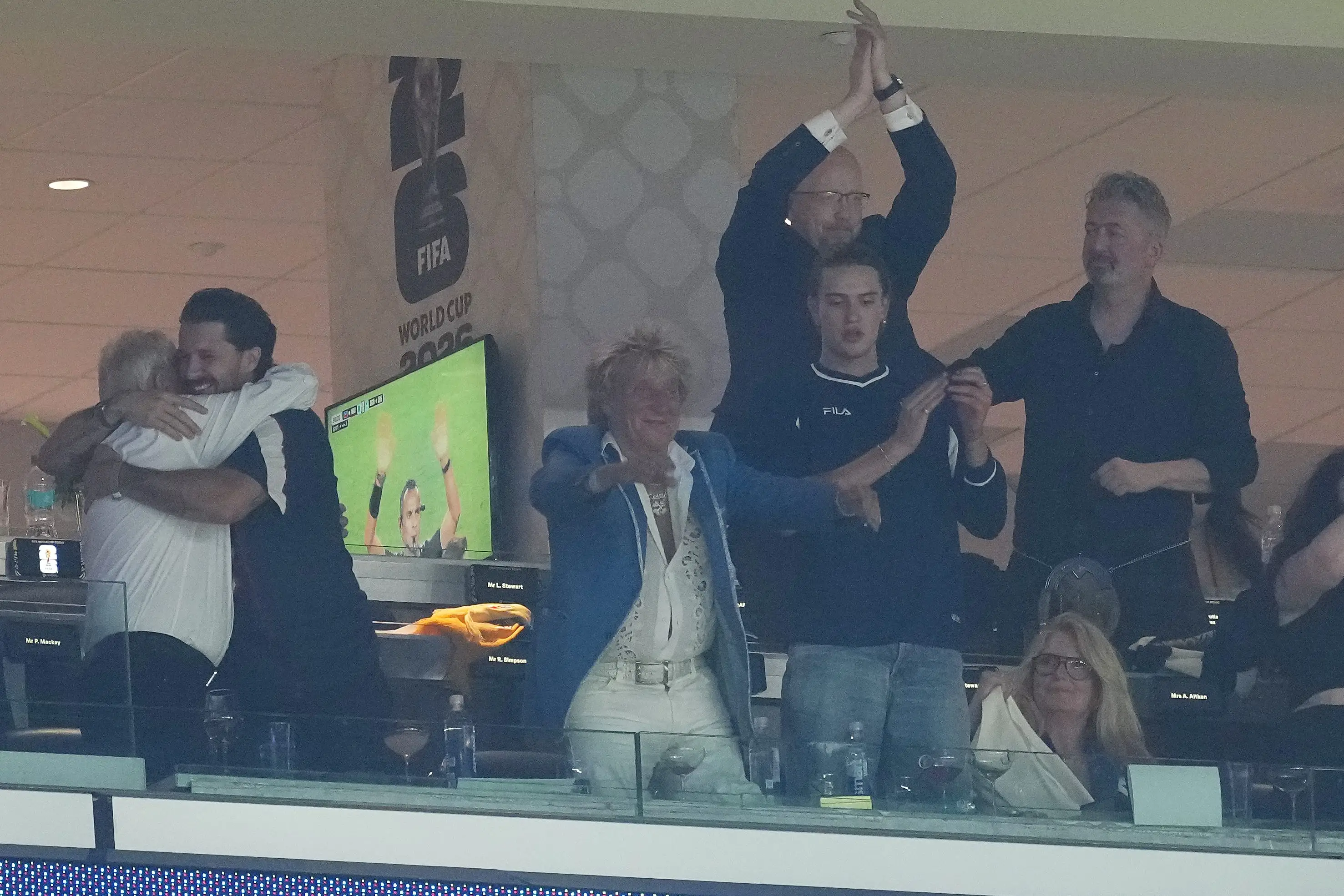 Sir Rod Stewart (third left) celebrates in the stands after the FIFA World Cup Group C match at Boston Stadium, Foxborough. Picture date: Saturday June 13, 2026.