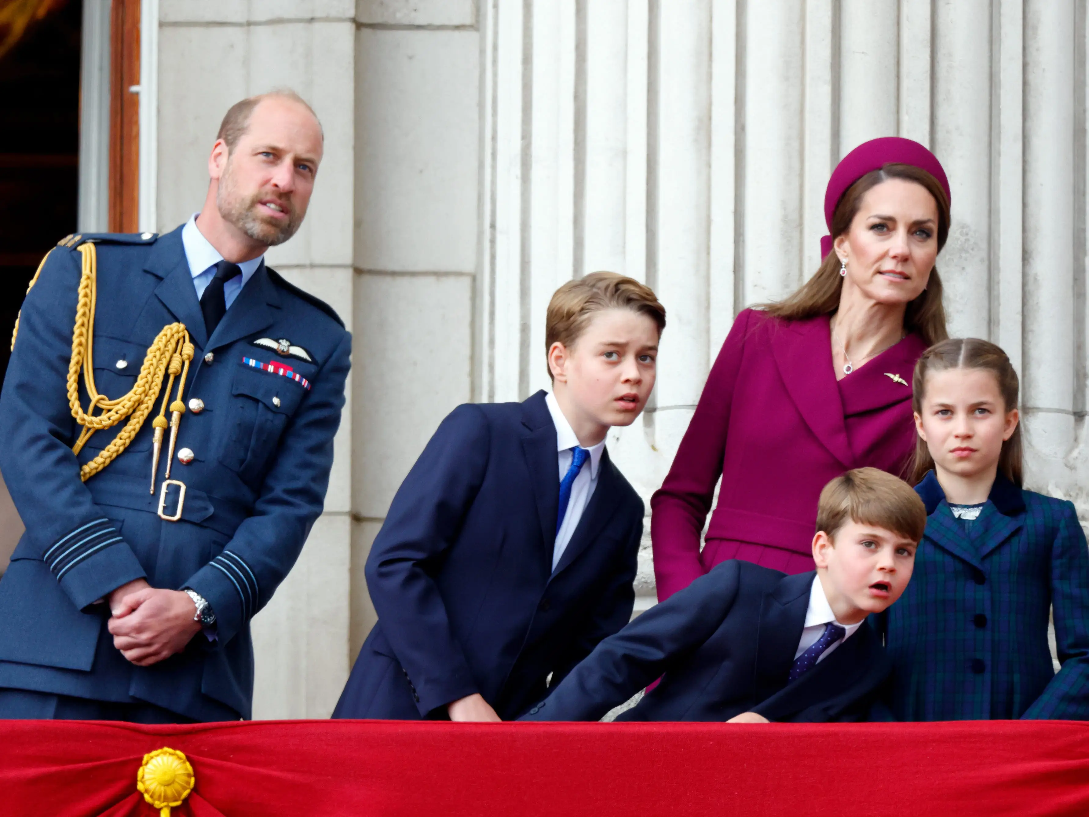 The Wales family watches a flypast from the balcony of Buckingham Palace to mark the 80th anniversary of VE Day in May 2025.
