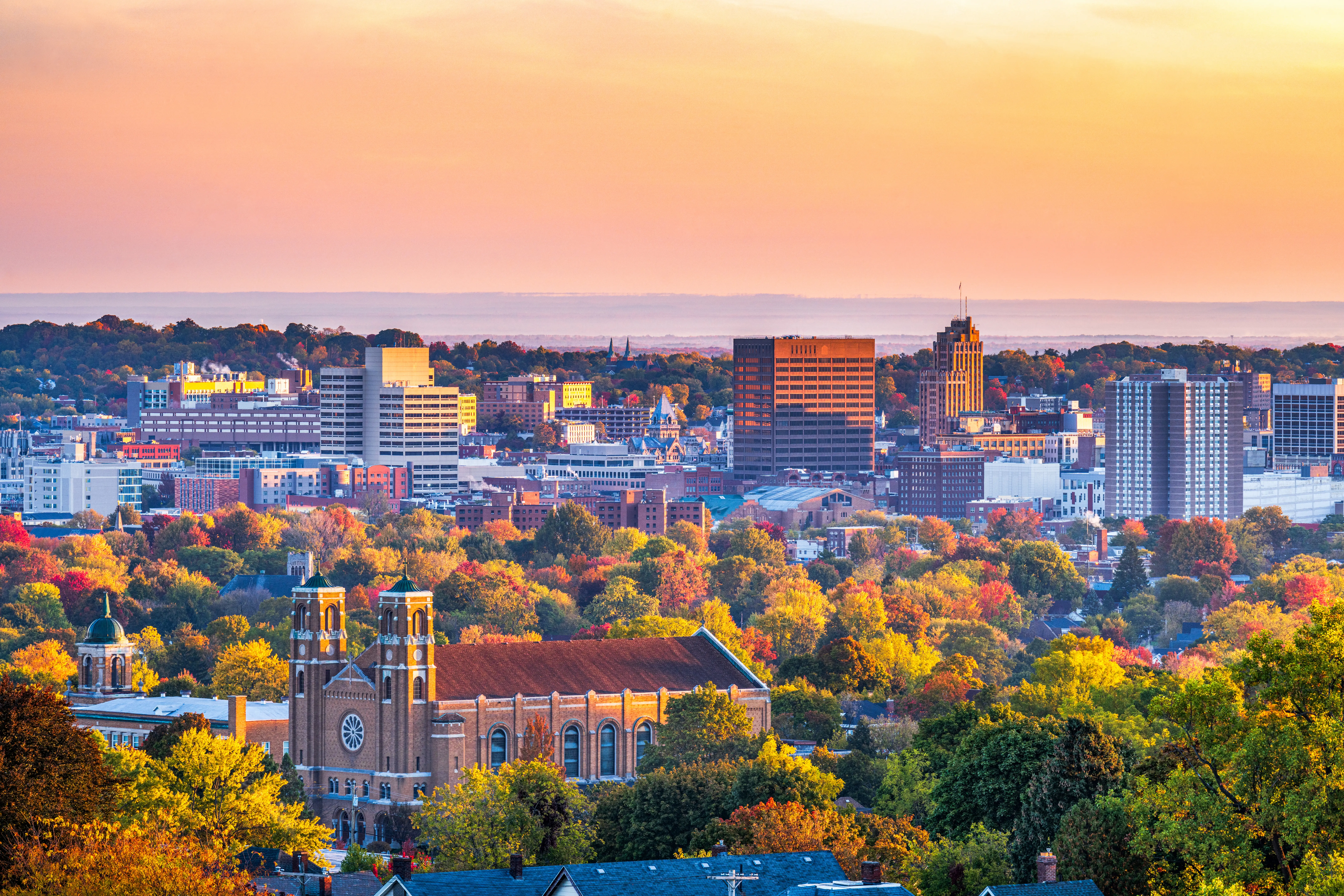 Syracuse, New York, downtown cityscape in autumn at dawn.