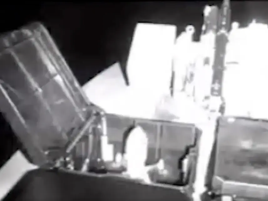 A screengrab of a Ukrainian interceptor drone about to launch from a naval drone.