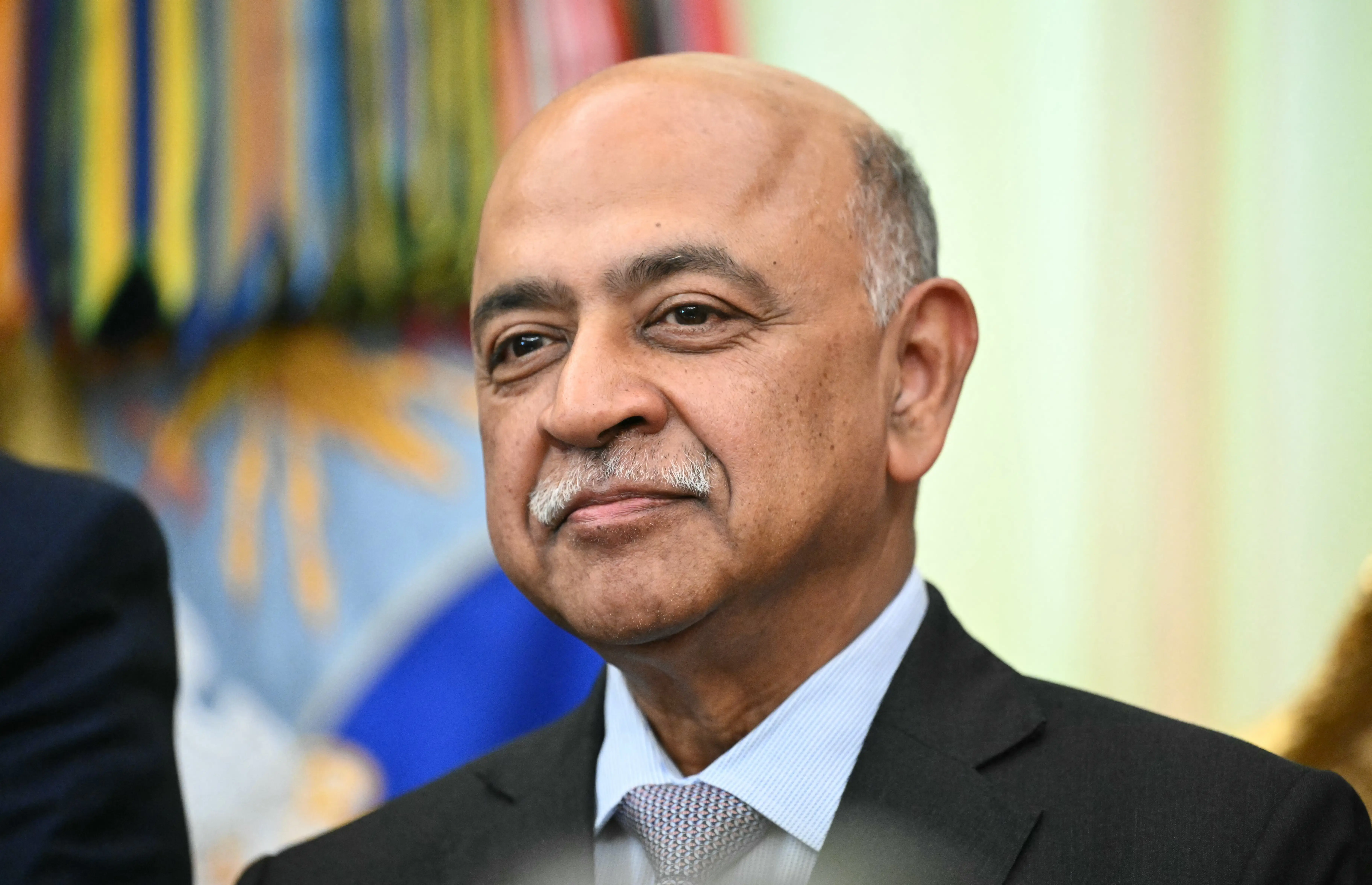 Arvind Krishna looks off camera