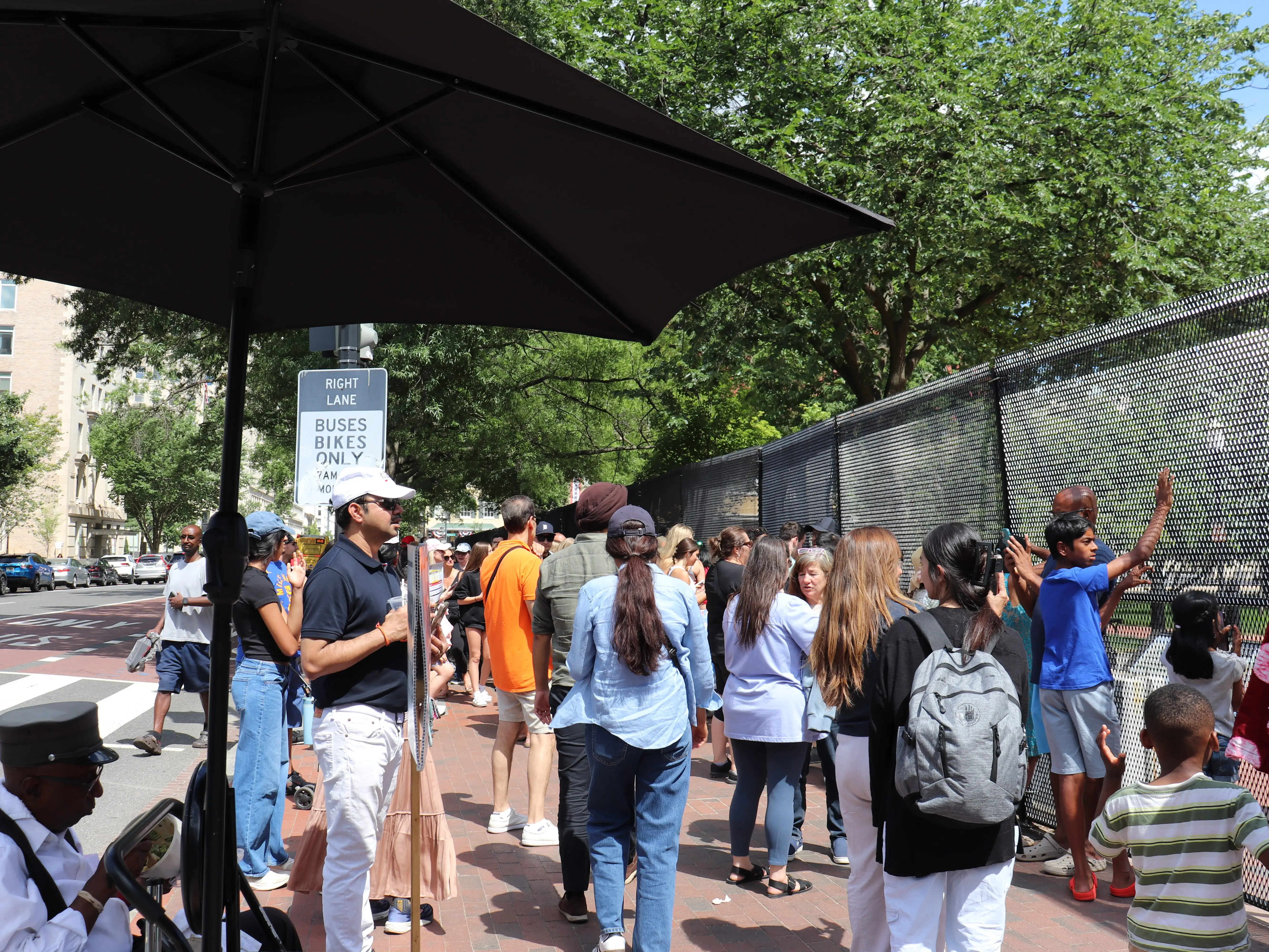 Crowd trying to get a view of the White House in Washington, DC, on June 19, 2026