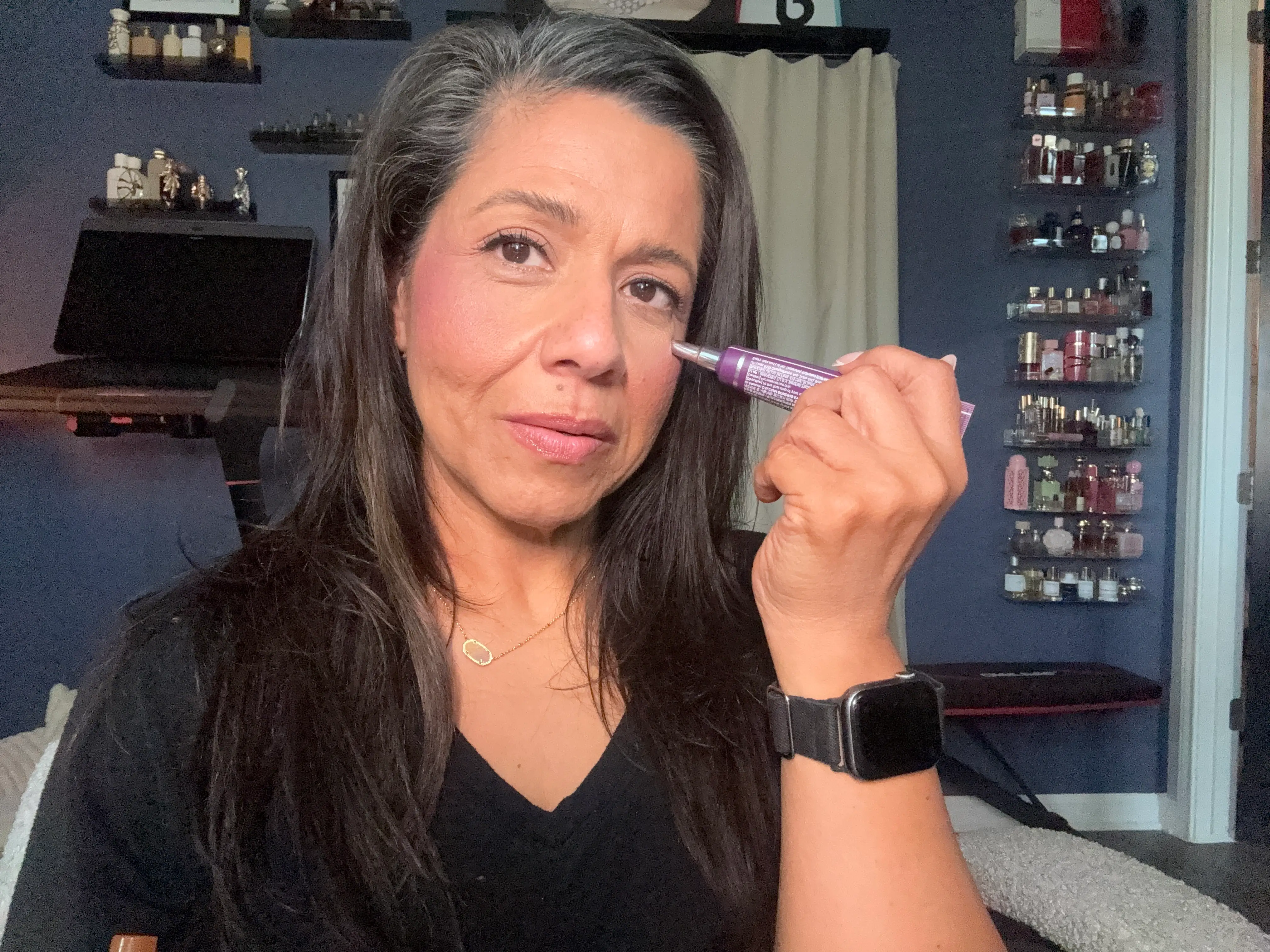 Author Suzie Jimenez applying eye cream