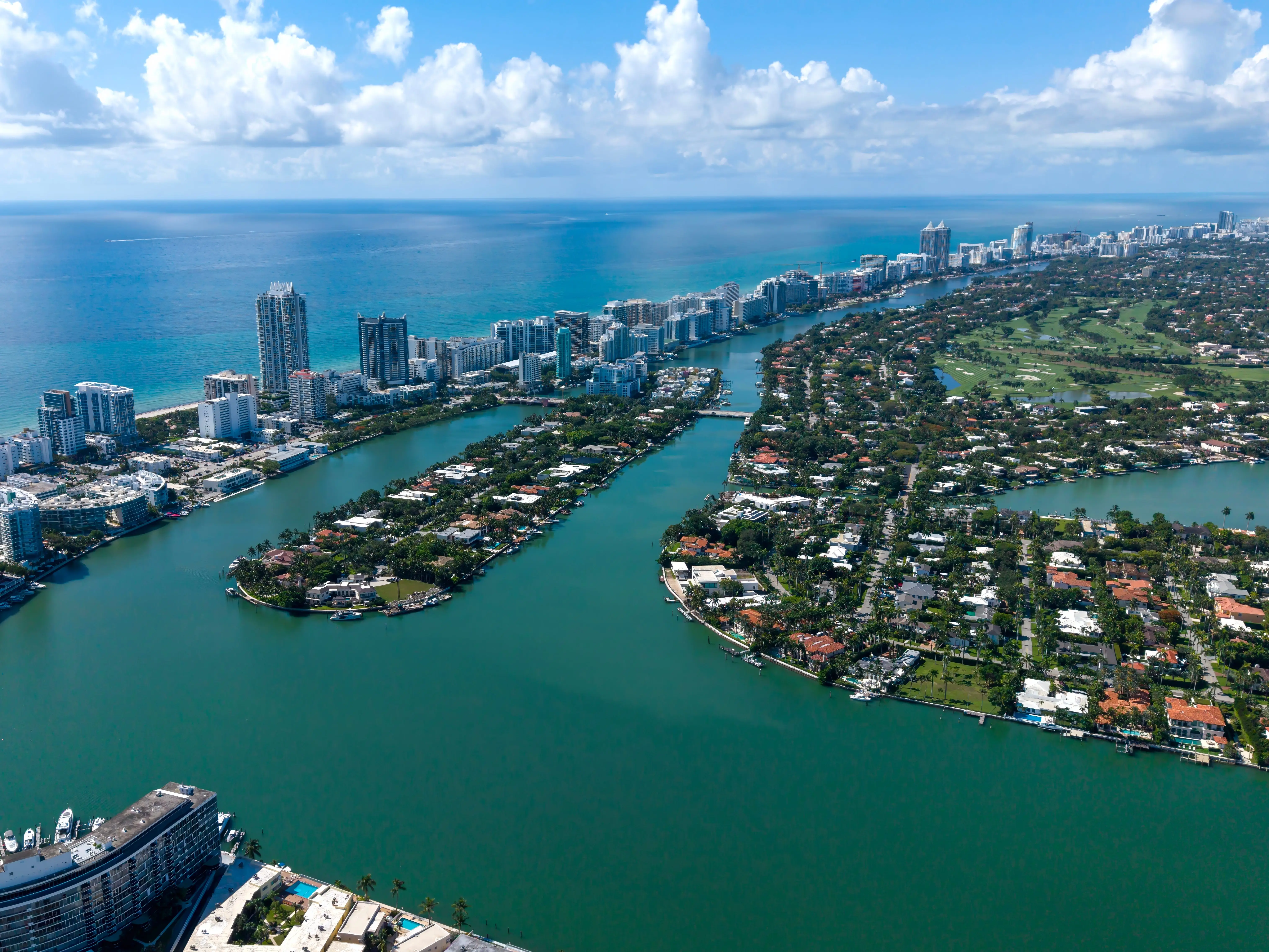 Aerial panorama of Miami Beach skyline between ocean and intracoastal waterway stock photo