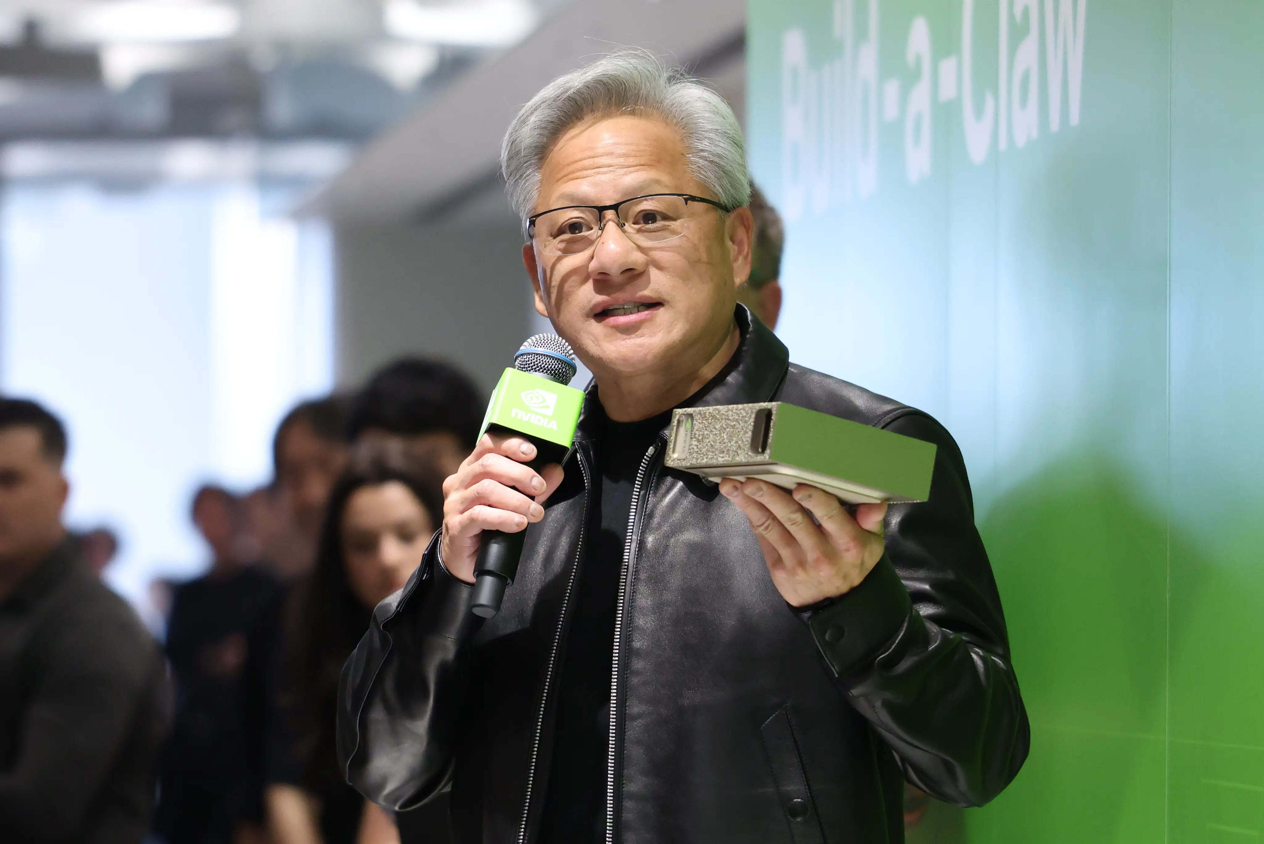 jensen huang holds a build a claw