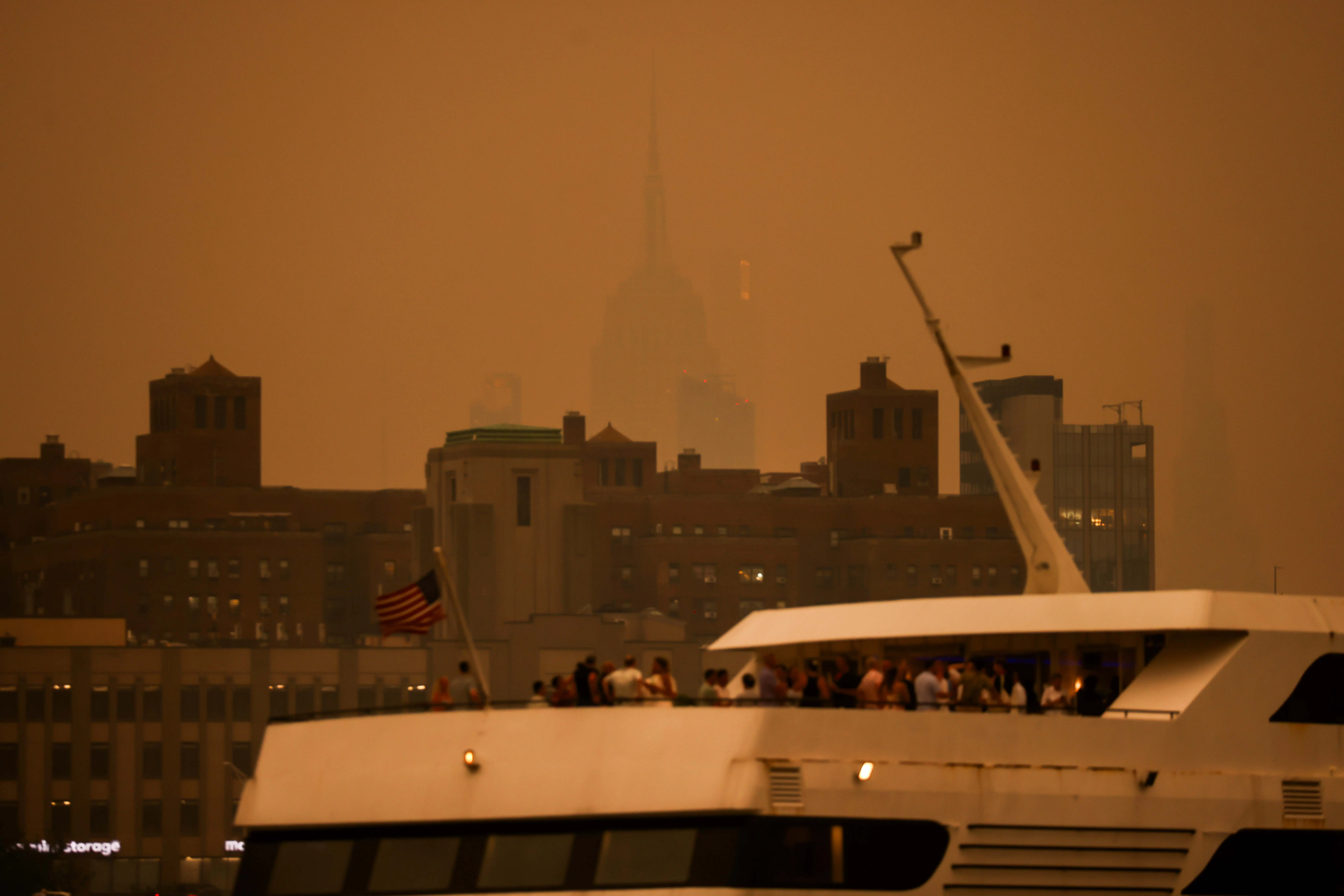 Smoke from wildfires in Canada shrouds the Manhattan skyline in the Brooklyn borough of New York, US, on Wednesday, July 15, 2026.