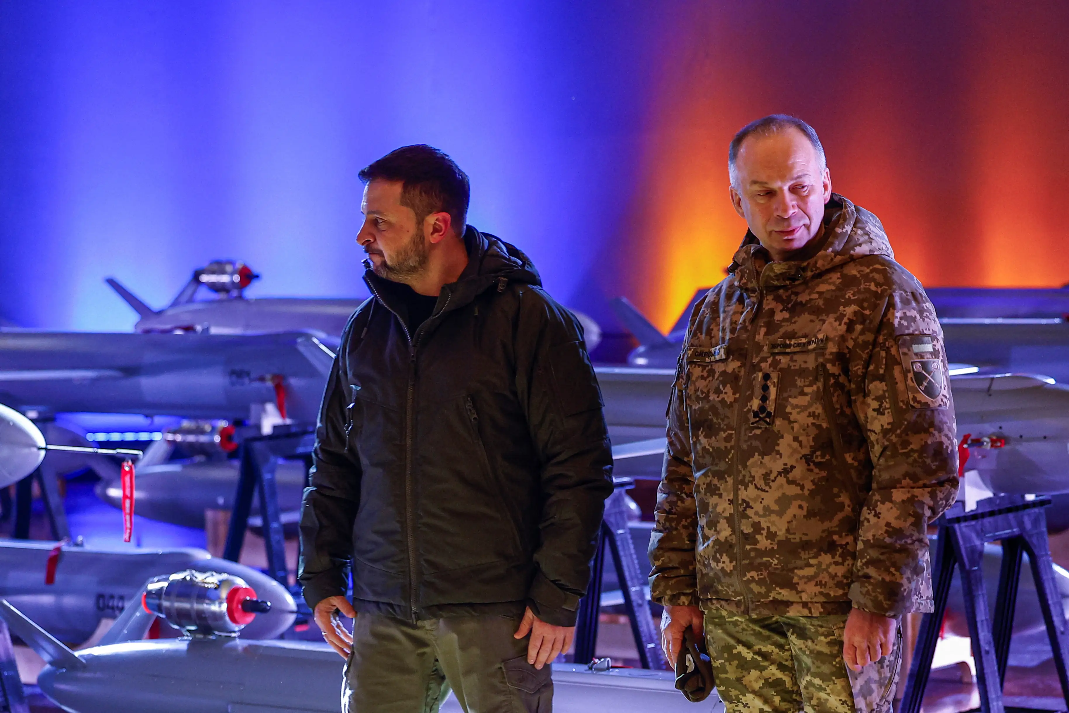 Ukraine's President Volodymyr Zelenskiy and Commander in Chief of the Ukrainian Armed Forces Colonel General Oleksandr Syrskyi visit an exhibition of new Ukrainian made drone-missiles Peklo dedicated to the Day of Ukrainian Armed Forces, amid Russia's attack on Ukraine, in Kyiv, Ukraine December 6, 2024.
