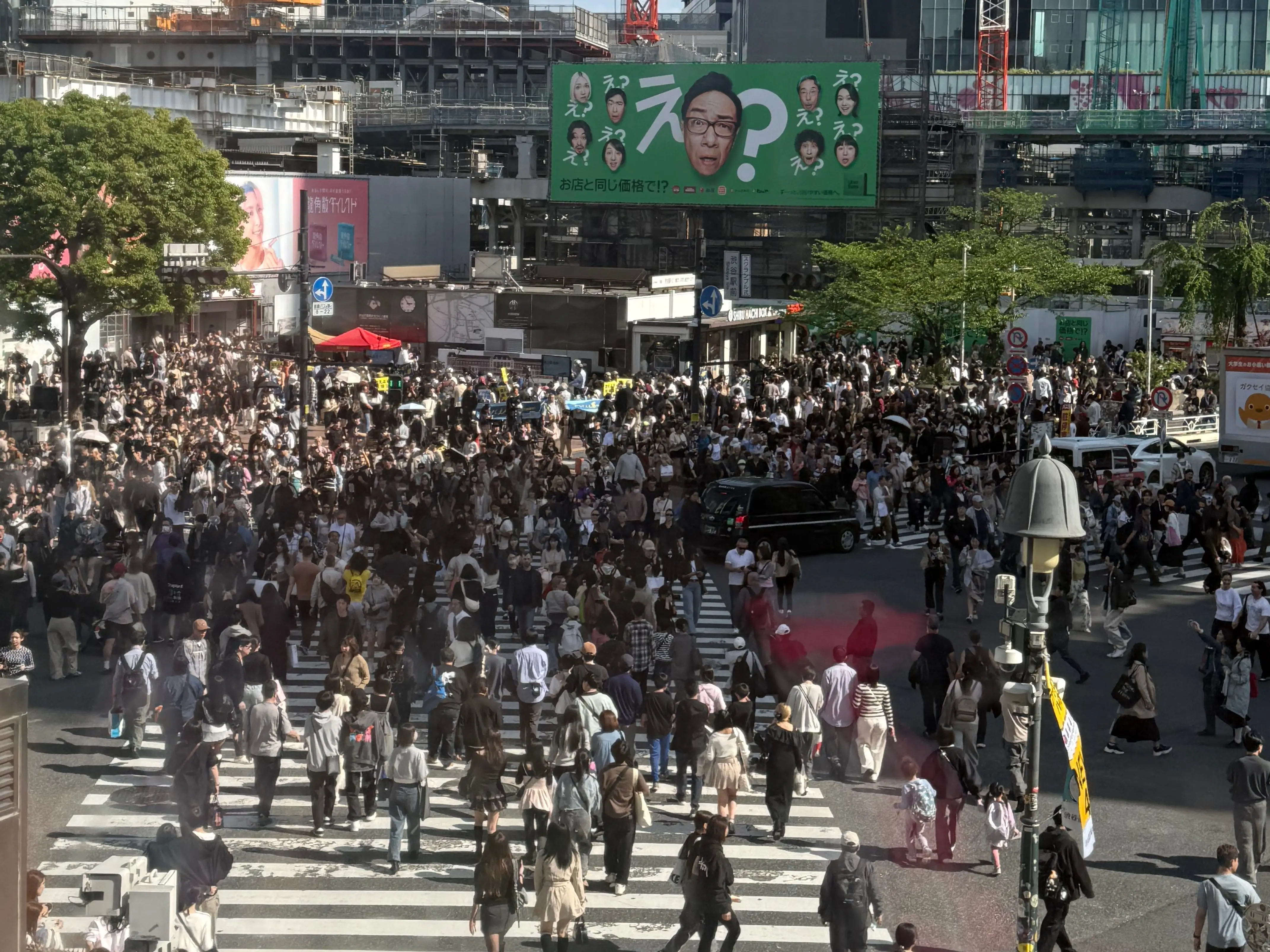 Crowds of people in Shibuya crossing