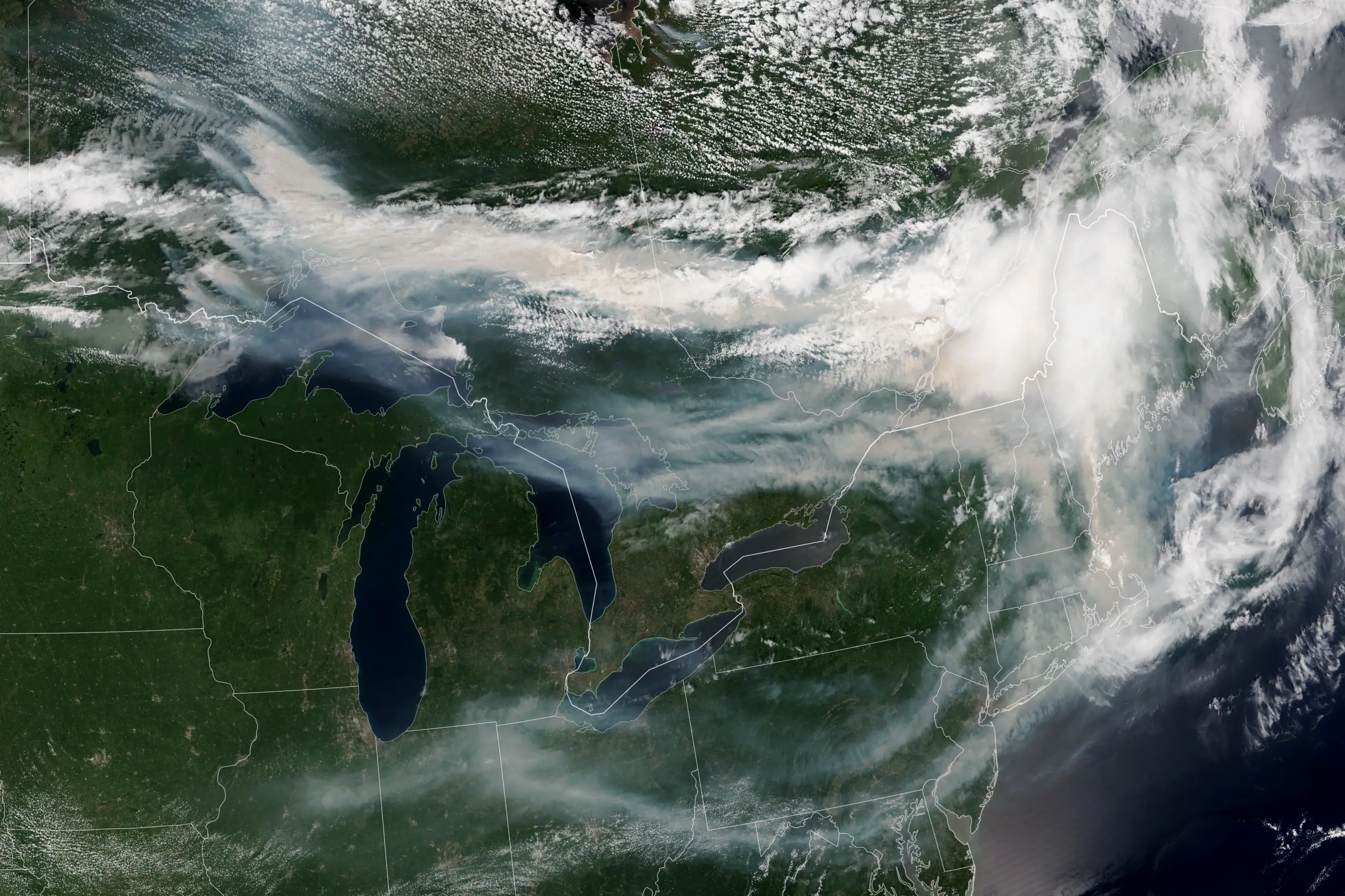 A satellite image shows smoke from wildfires in Canada and the US.