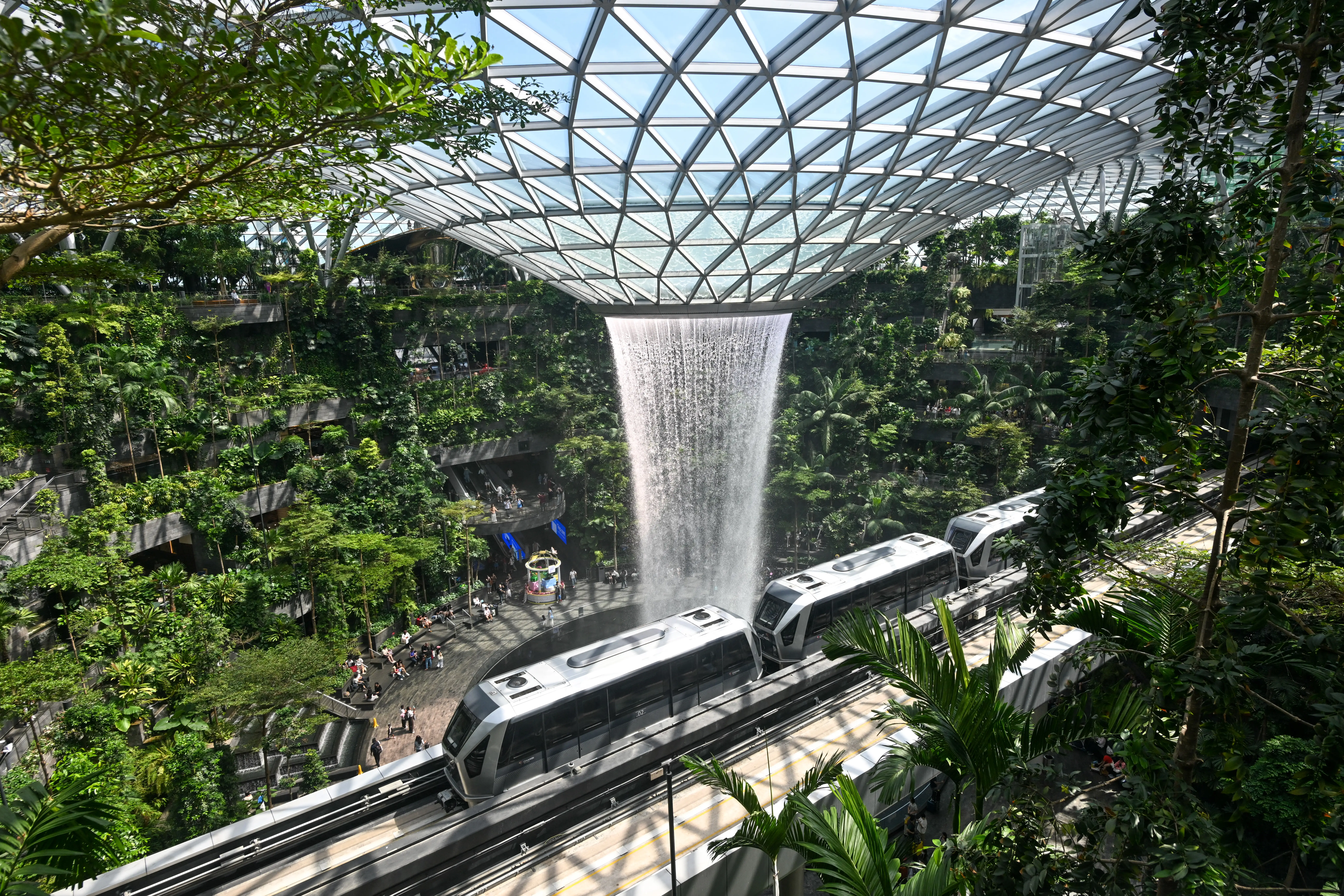 Fountain, glass ceiling, plants in Changi Airport