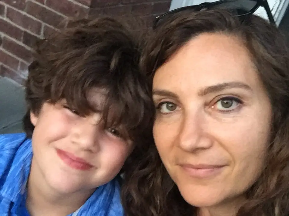 Woman smiling with her son