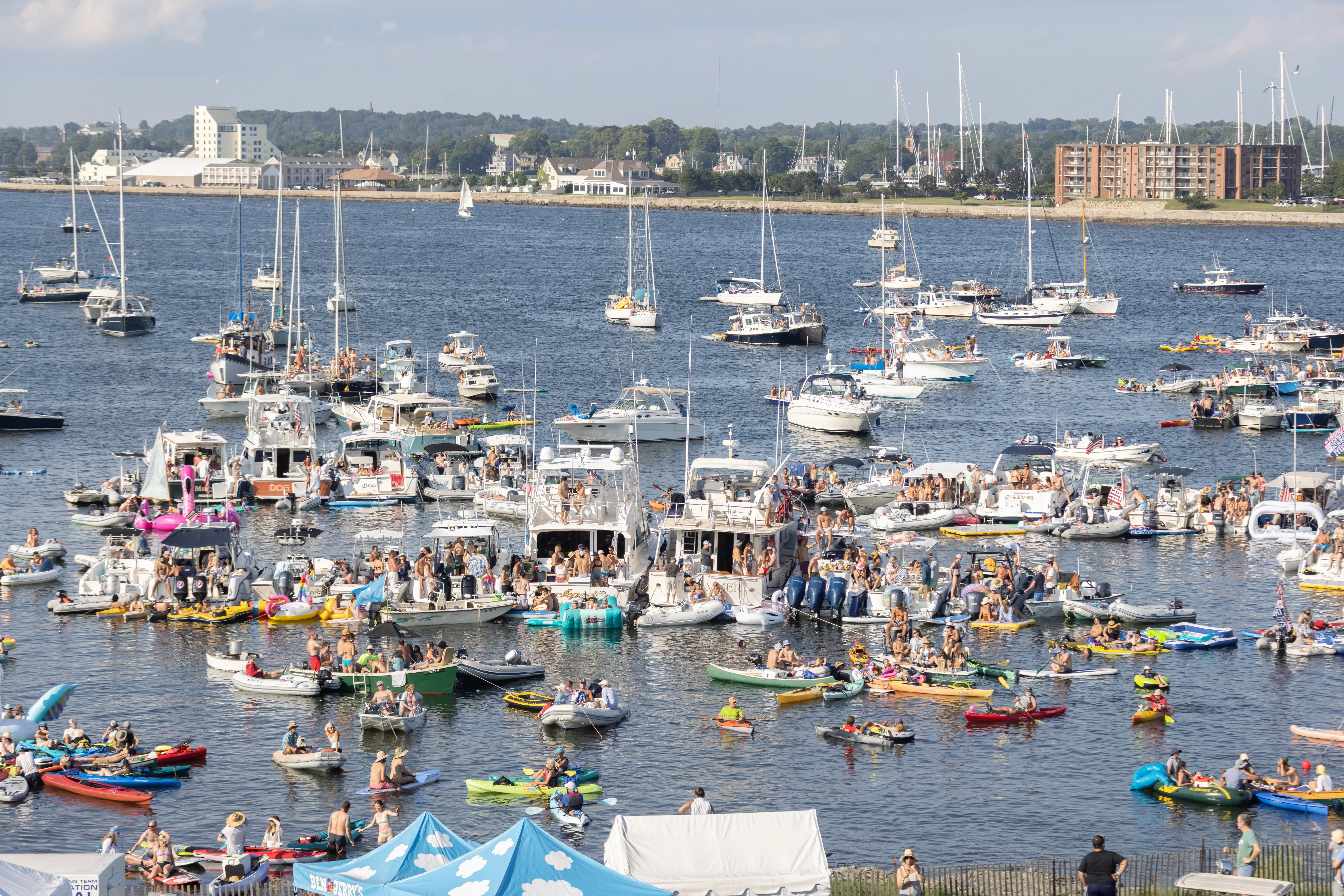 View of the crowd and boats during Newport Folk Festival