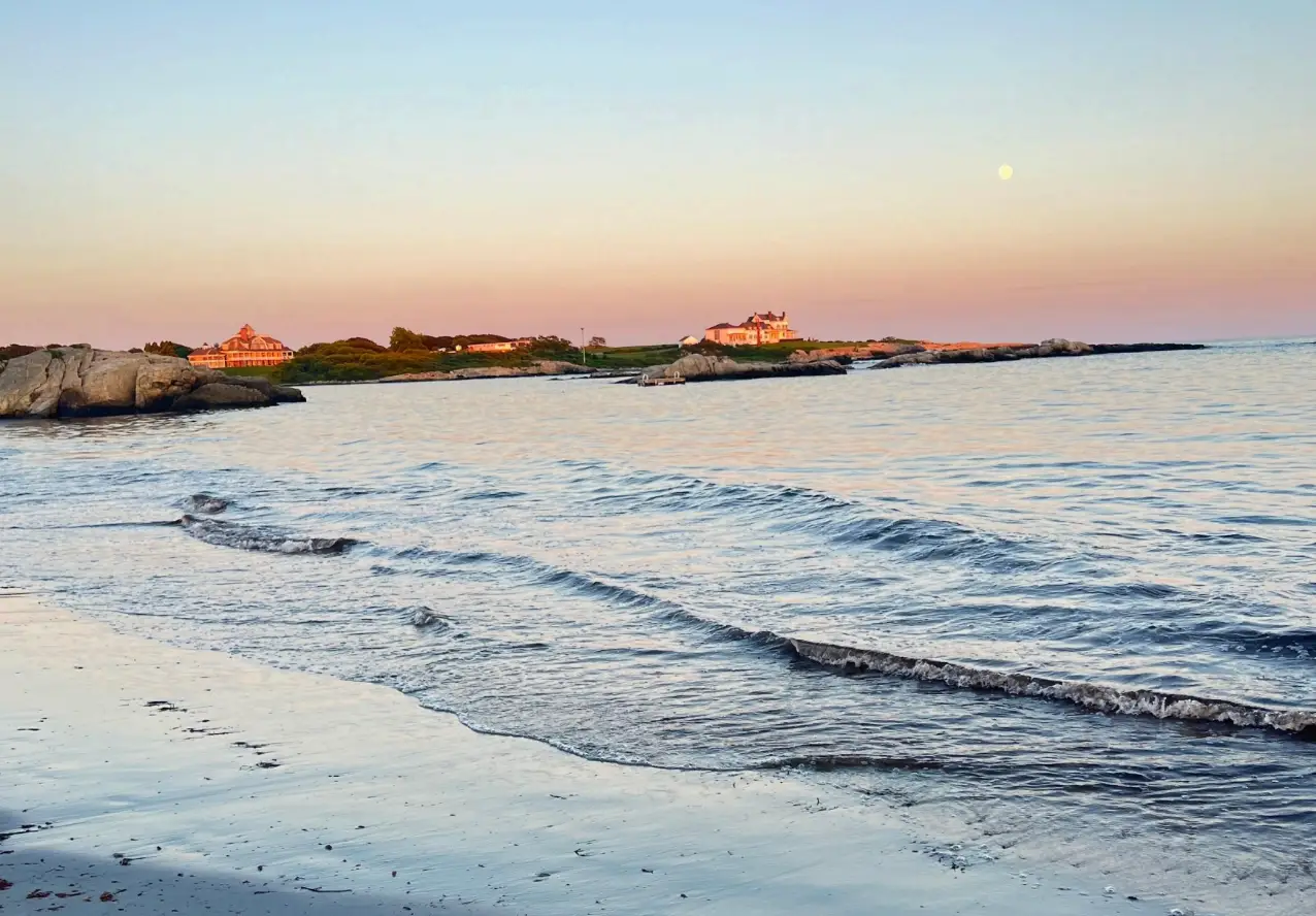 Newport beach under blue, pink, yellow sky
