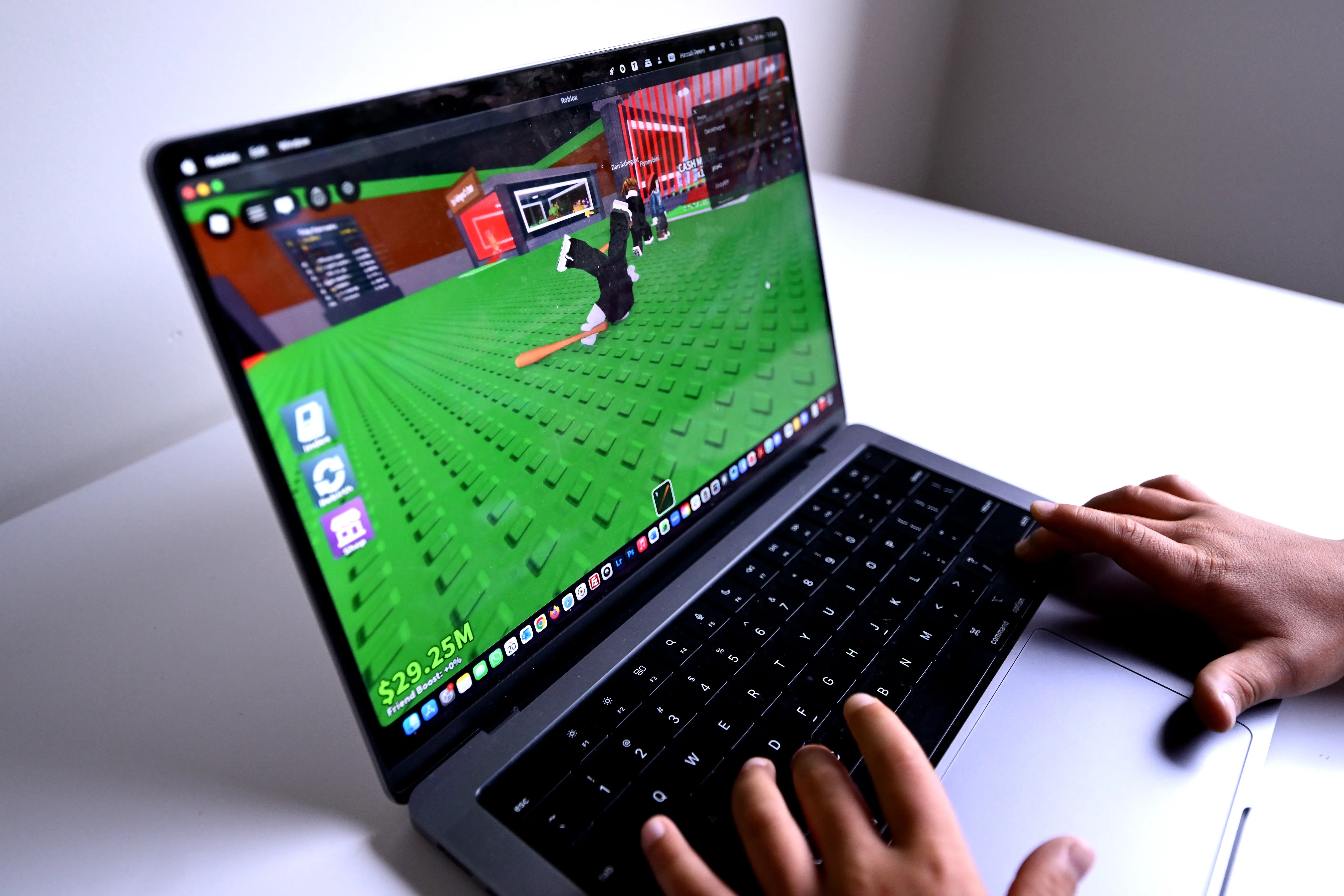 A Roblox player uses the game on a personal computer.