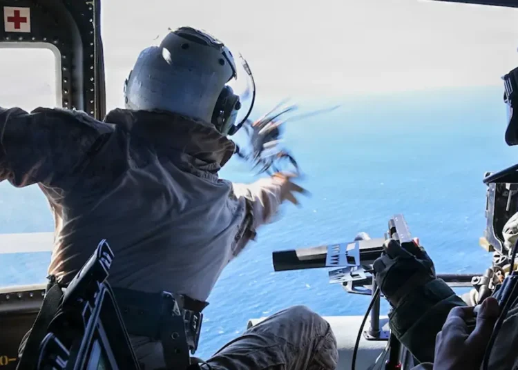 US Marines launched a drone from a moving helicopter to scout a ship for a special operations boarding team