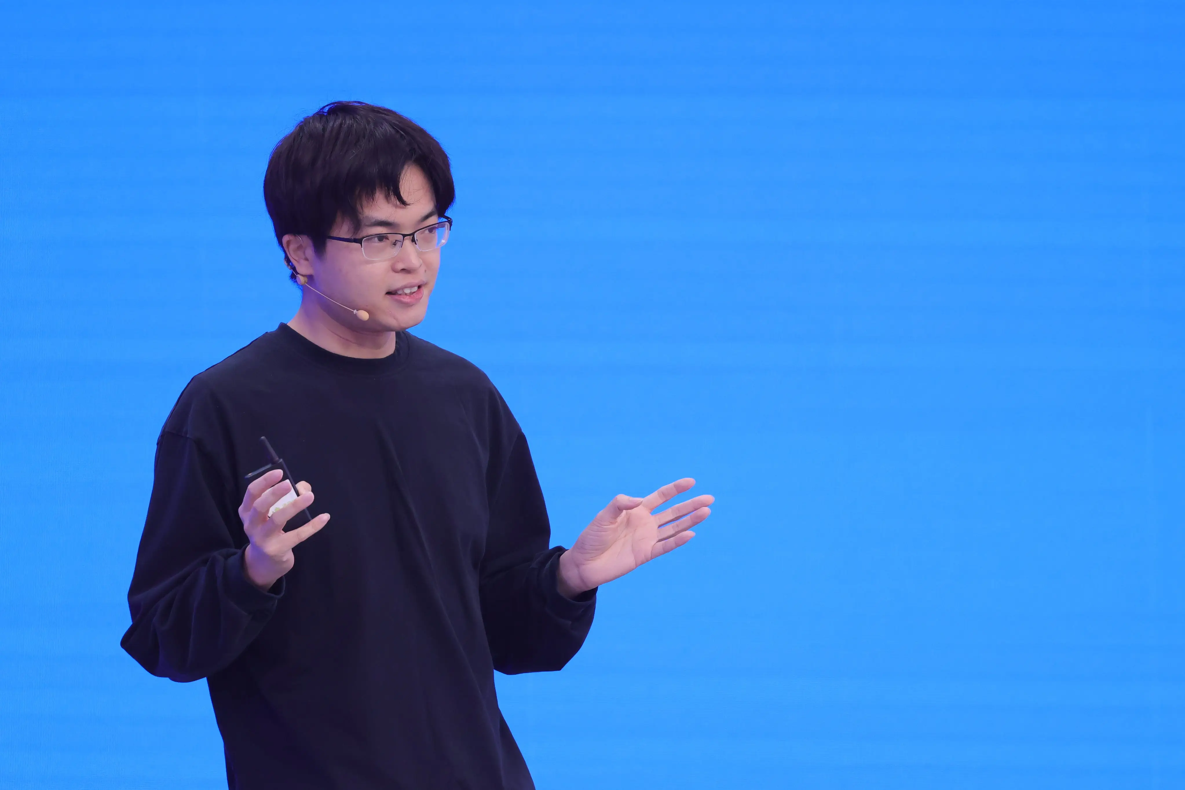 Moonshot AI CEO Yang Zhilin speaks at a conference