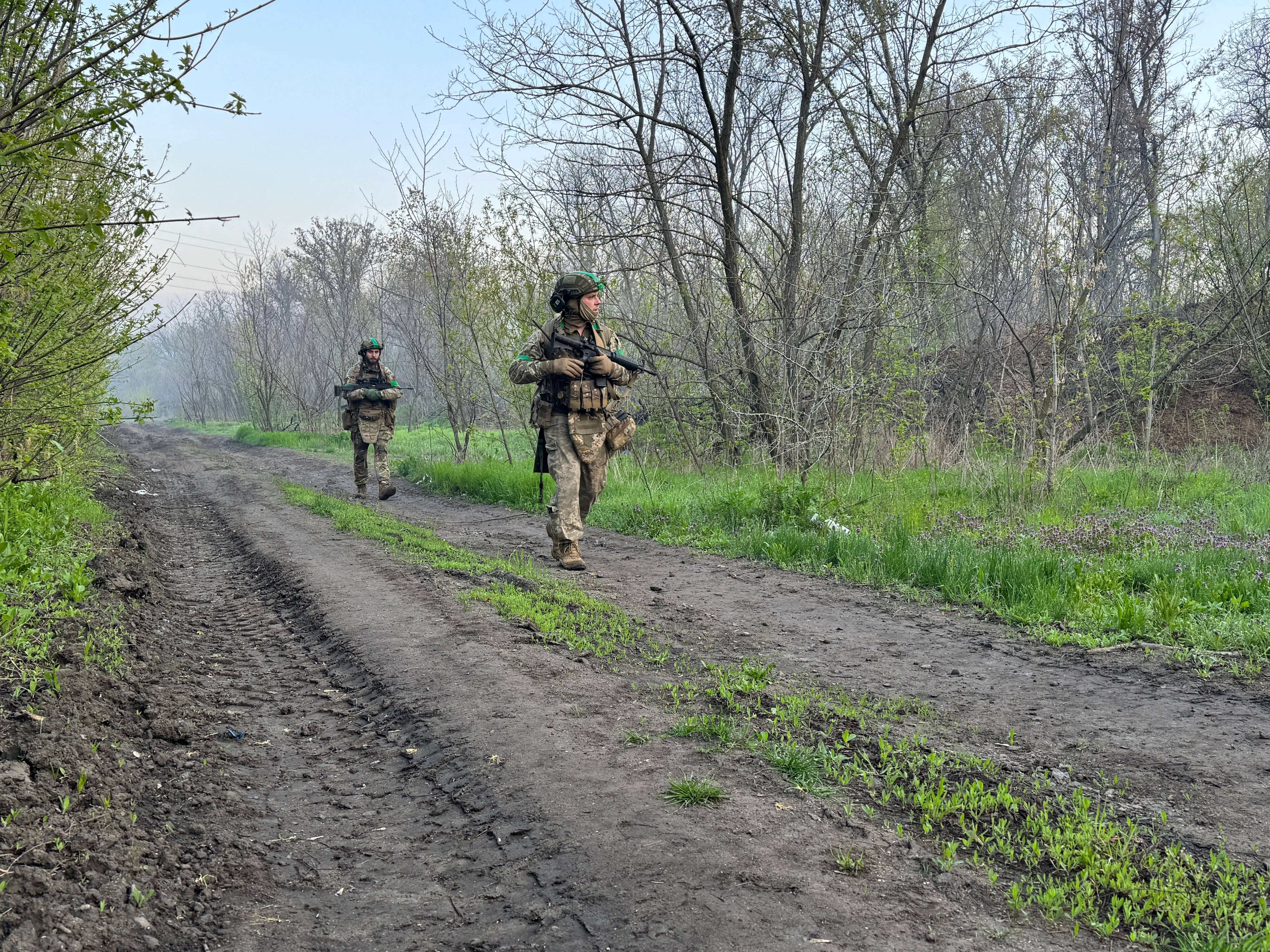 Due to massive Russian drone attacks, Ukrainian soldiers walk several dozen kilometers on foot to their positions on April 17, 2026 in Donetsk Oblast, Ukraine.