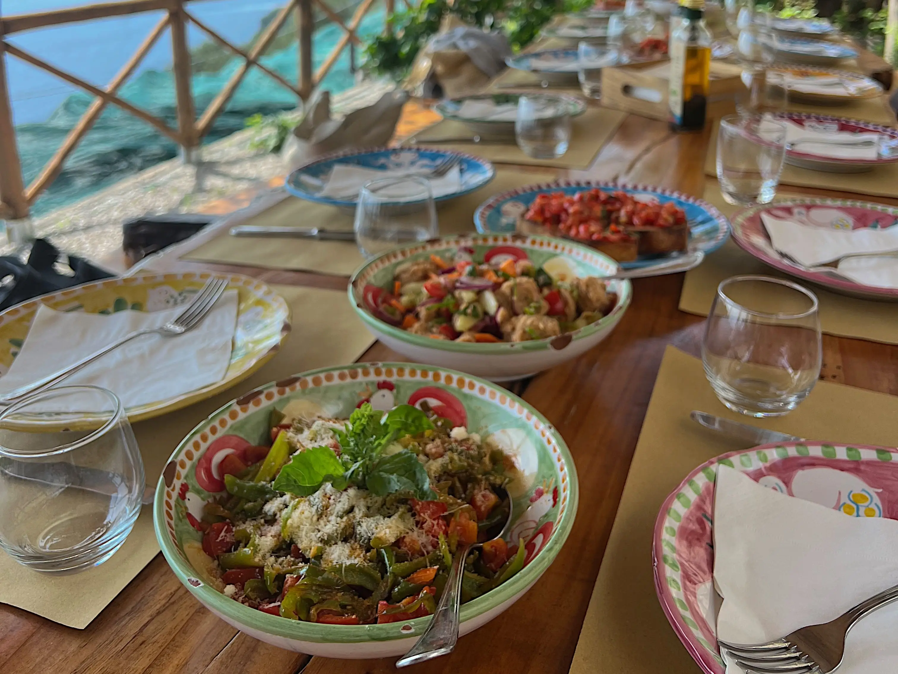 Table set with dishes of foods outdoors