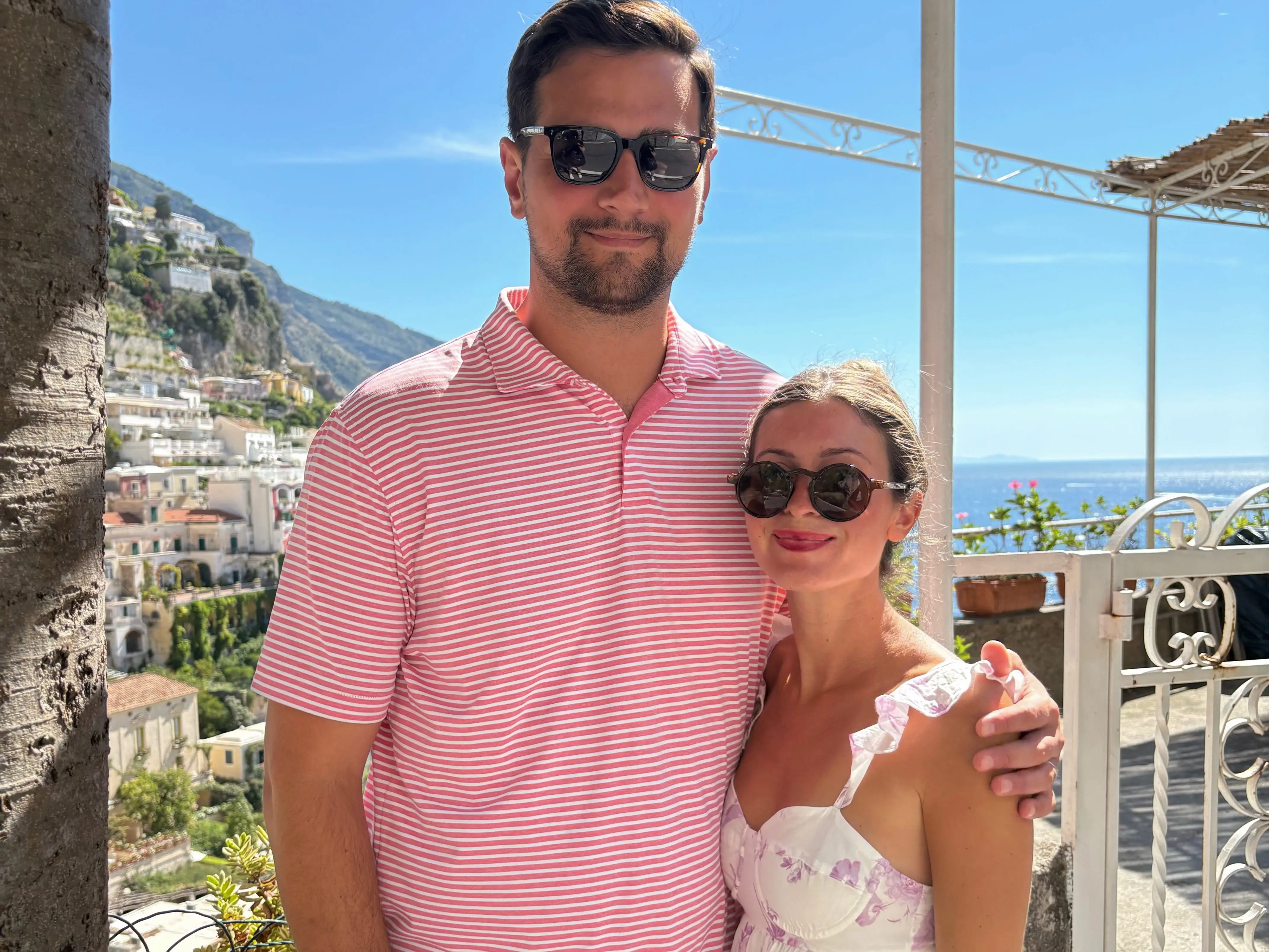 Author and husband smiling in Positano