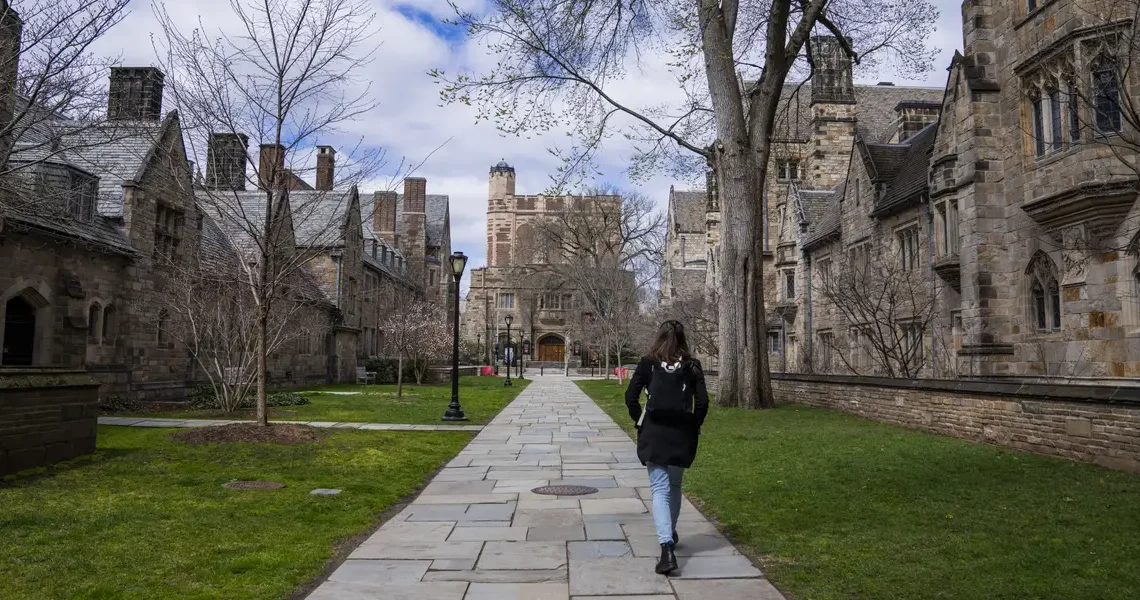 Students who attended 10 elite schools accused of price fixing are now getting payments from a $284 million settlement