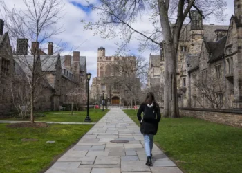 Students who attended 10 elite schools accused of price fixing are now getting payments from a $284 million settlement