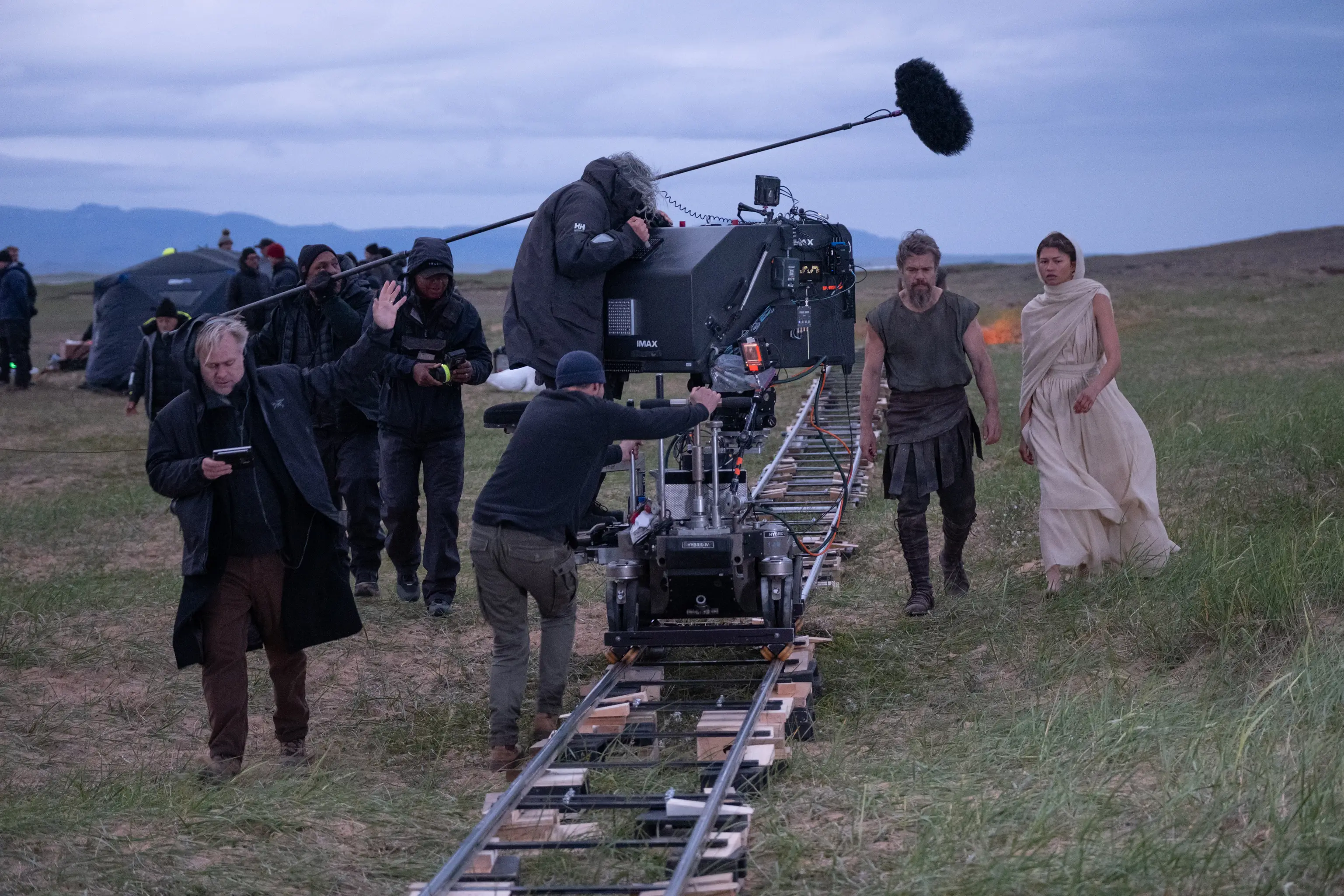 Director Christopher Nolan with Matt Damon and Zendaya on the set of 